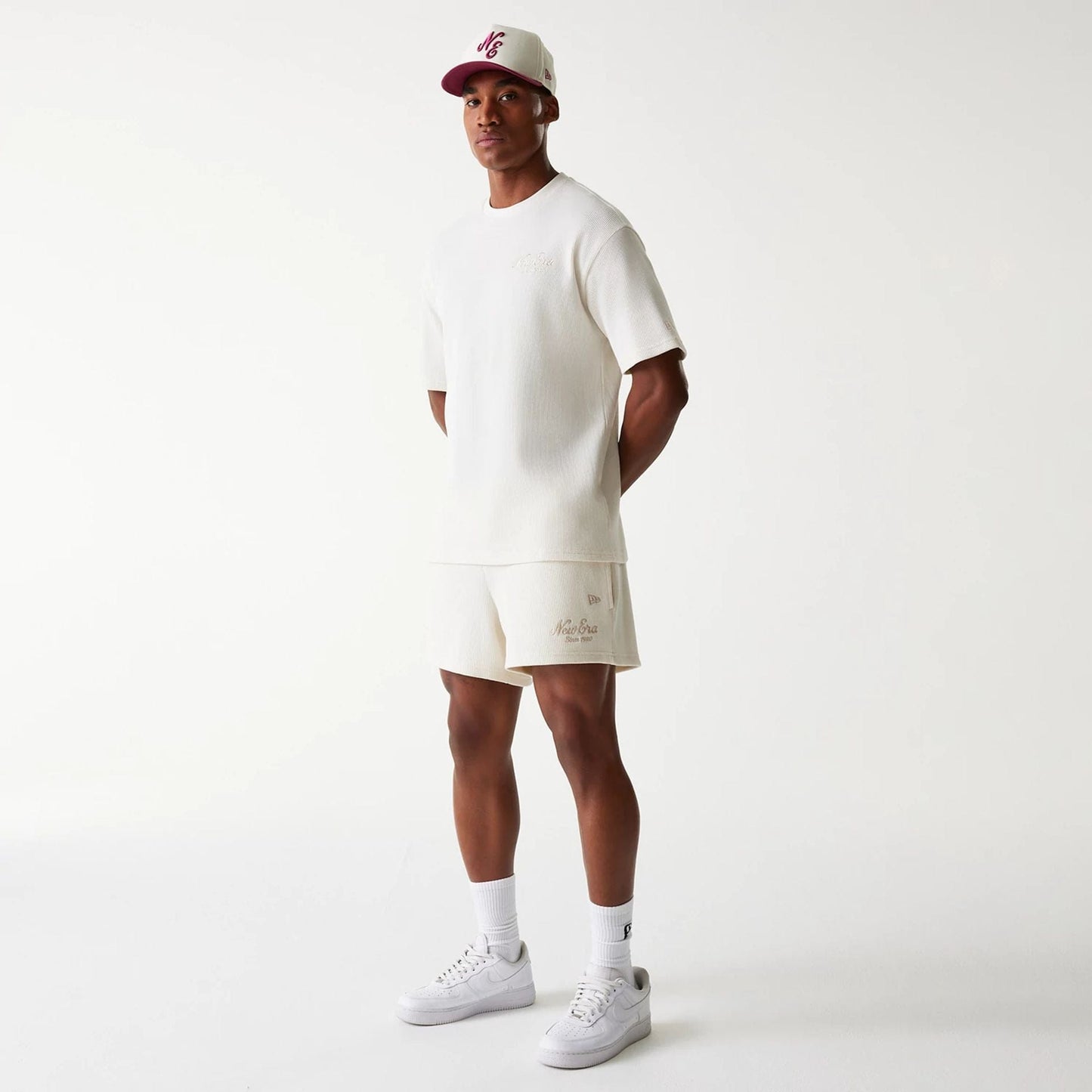 The Male model is wearing New Era Waffle Open White Shorts 8