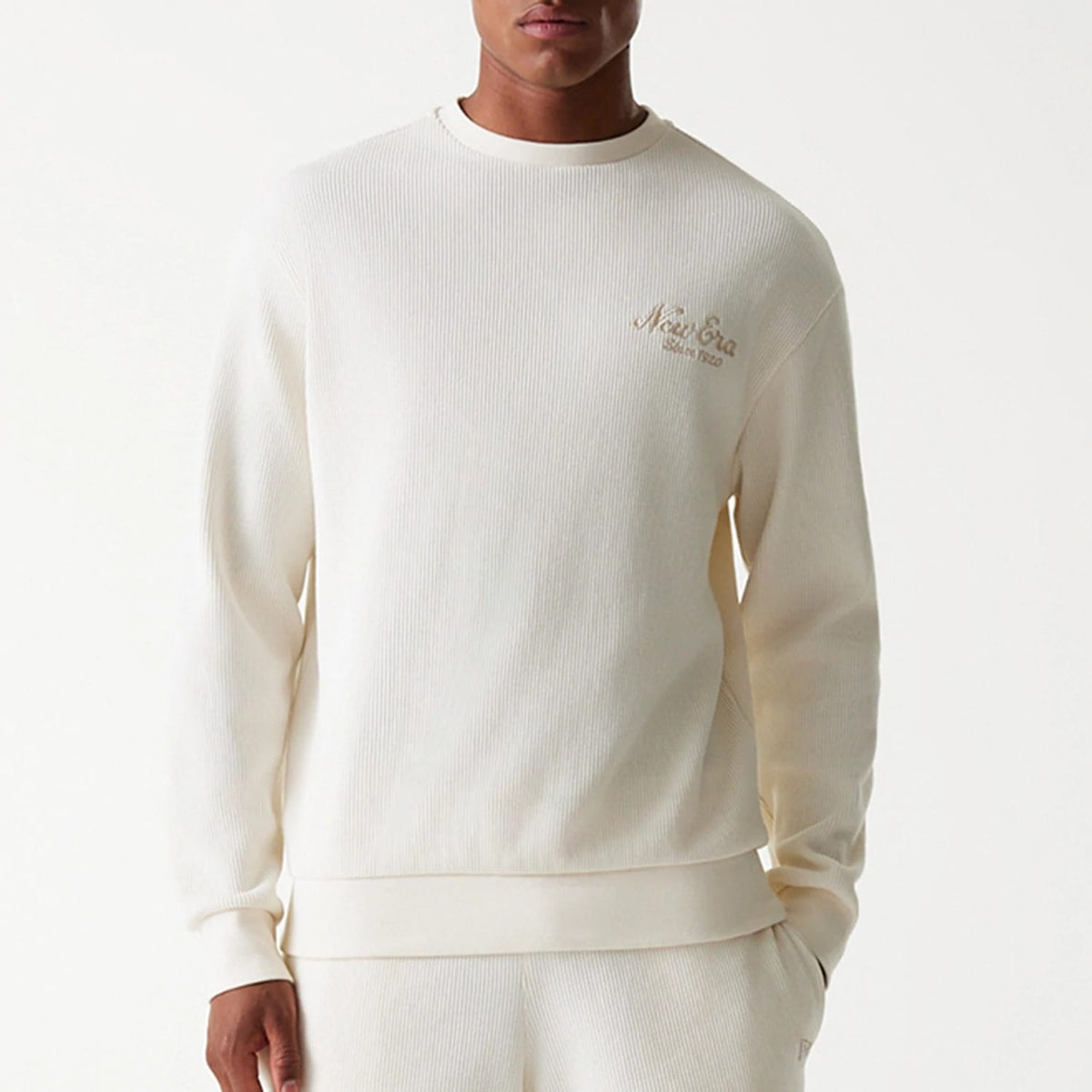 The Male model is wearing New Era Waffle Open White Oversized Crew Neck Sweater 5