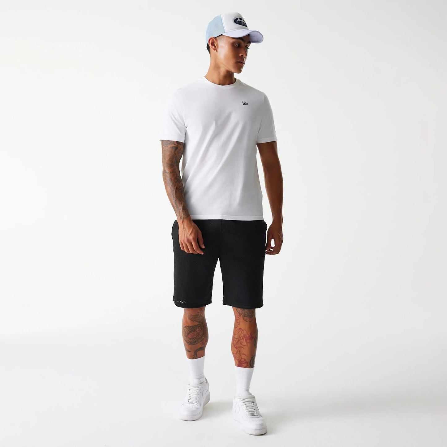 The Male model is wearing New Era Black Mesh Shorts 8