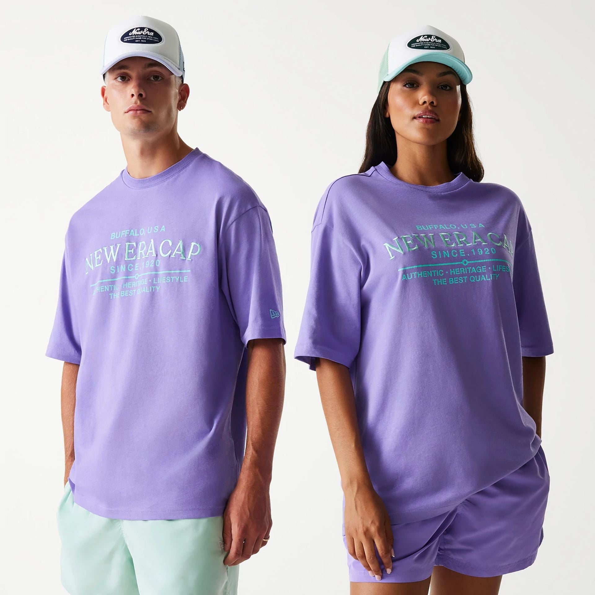 The Male model is wearing New Era Graphic Purple Oversized T-Shirt 1