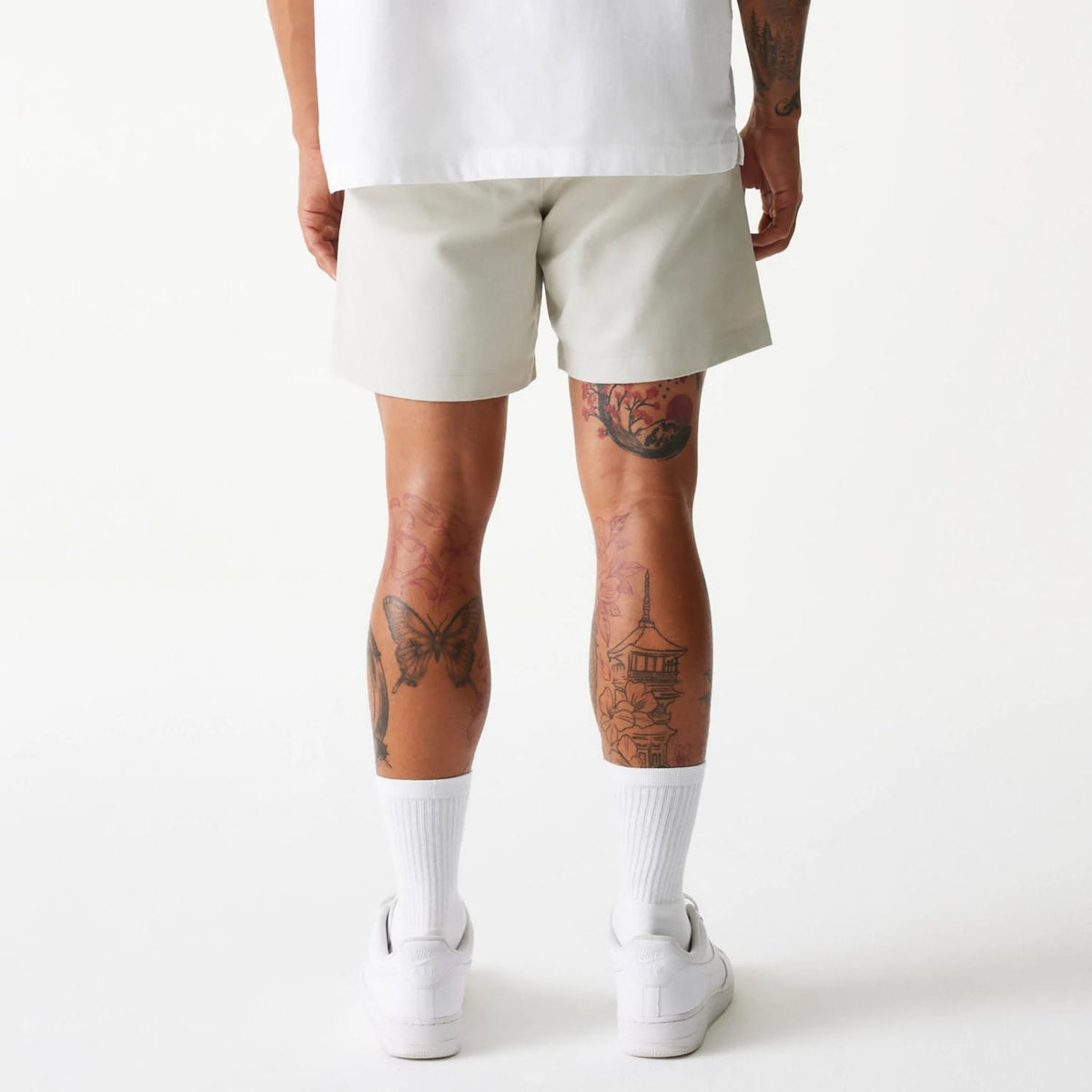 The Male model is wearing New Era Cream Chino Shorts 2