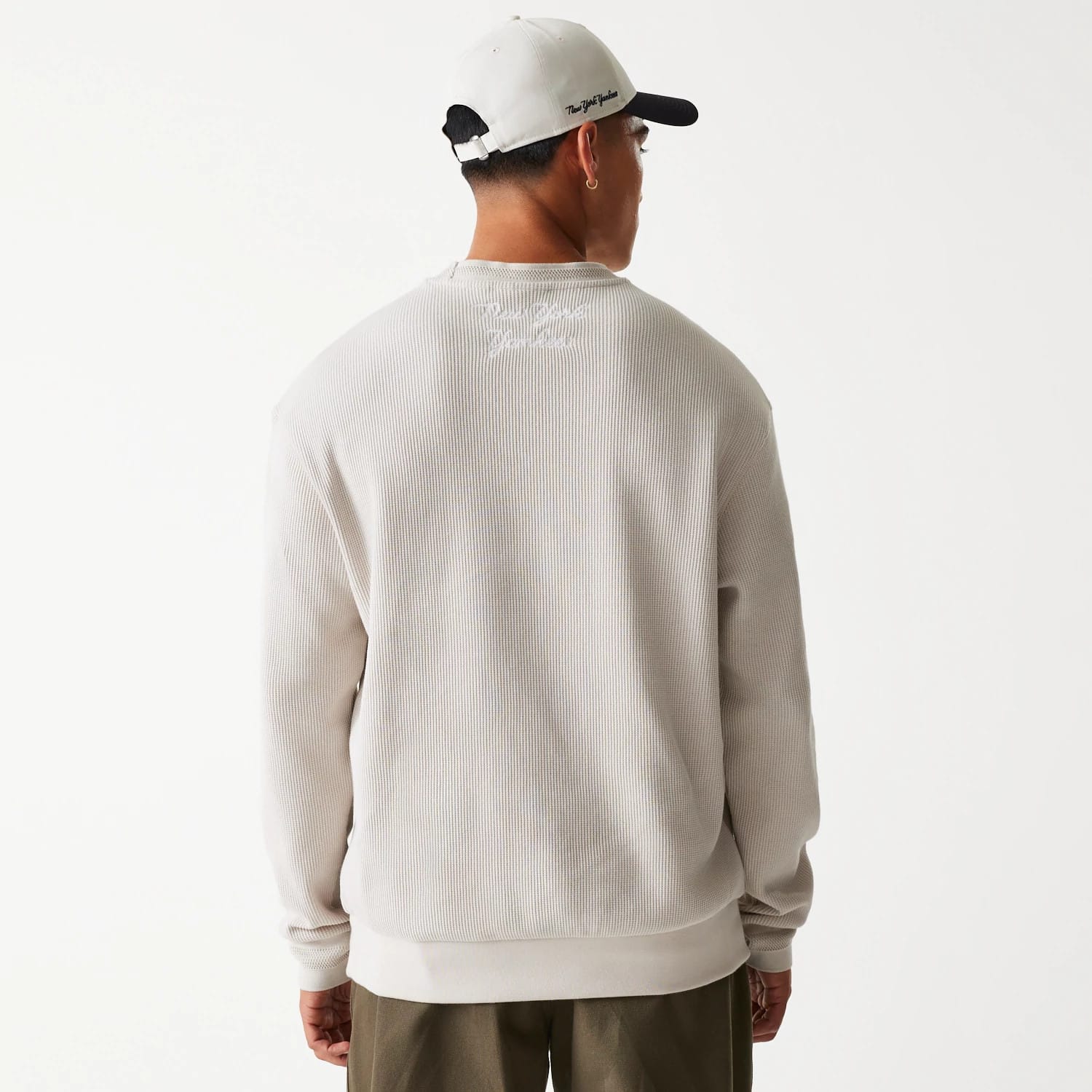 The Male model is wearing New York Yankees MLB Waffle Cream Oversized Crew Neck Sweater 2