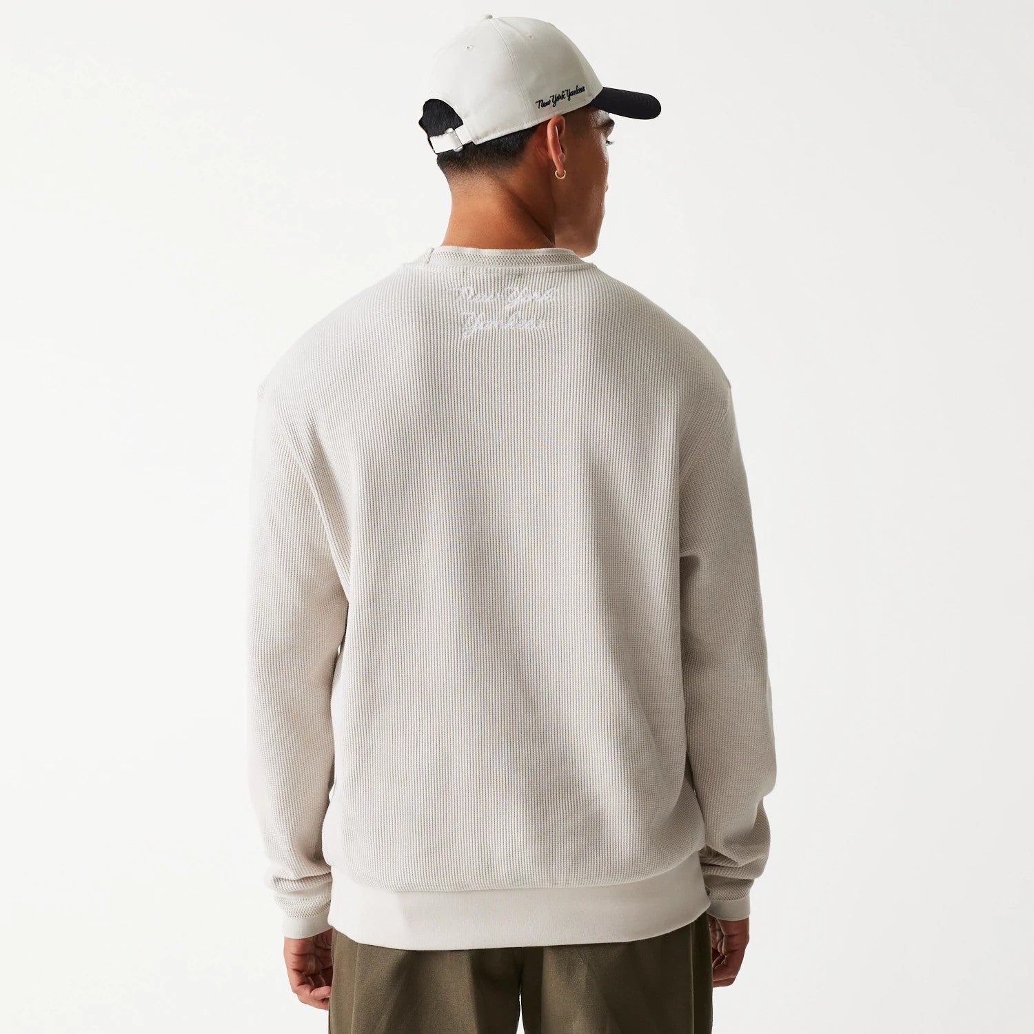The Male model is wearing New York Yankees MLB Waffle Cream Oversized Crew Neck Sweater 2