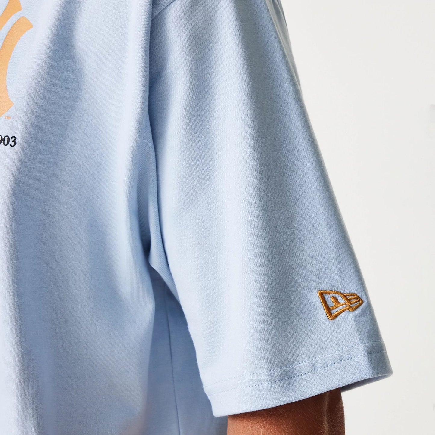 The Male model is wearing New York Yankees MLB Baseball Graphic Pastel Blue Oversized T-Shirt 8