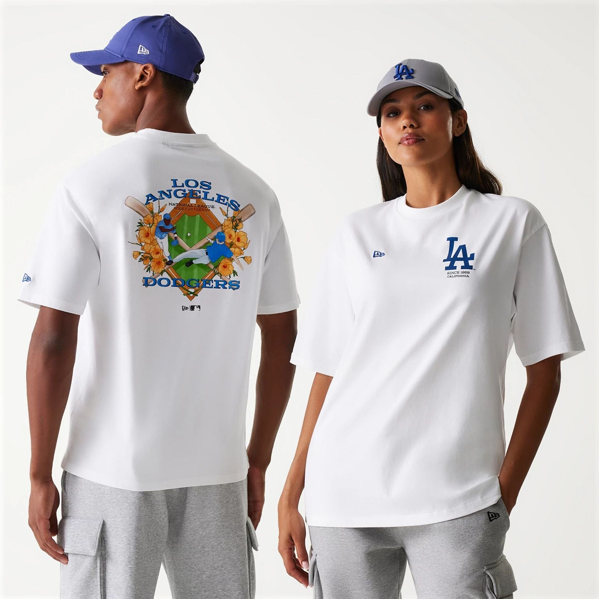 The Male model is wearing LA Dodgers MLB Baseball Graphic White Oversized T-Shirt 1