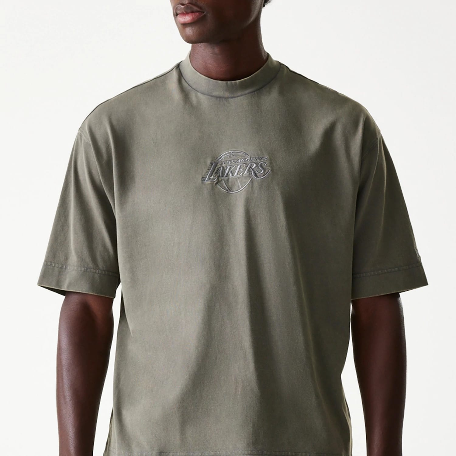 New Era LA Lakers NBA Washed Grey Box T-Shirt, front view showing the washed grey fabric with a raised LA Lakers logo centred on the chest and short sleeves with a round neckline on-model.