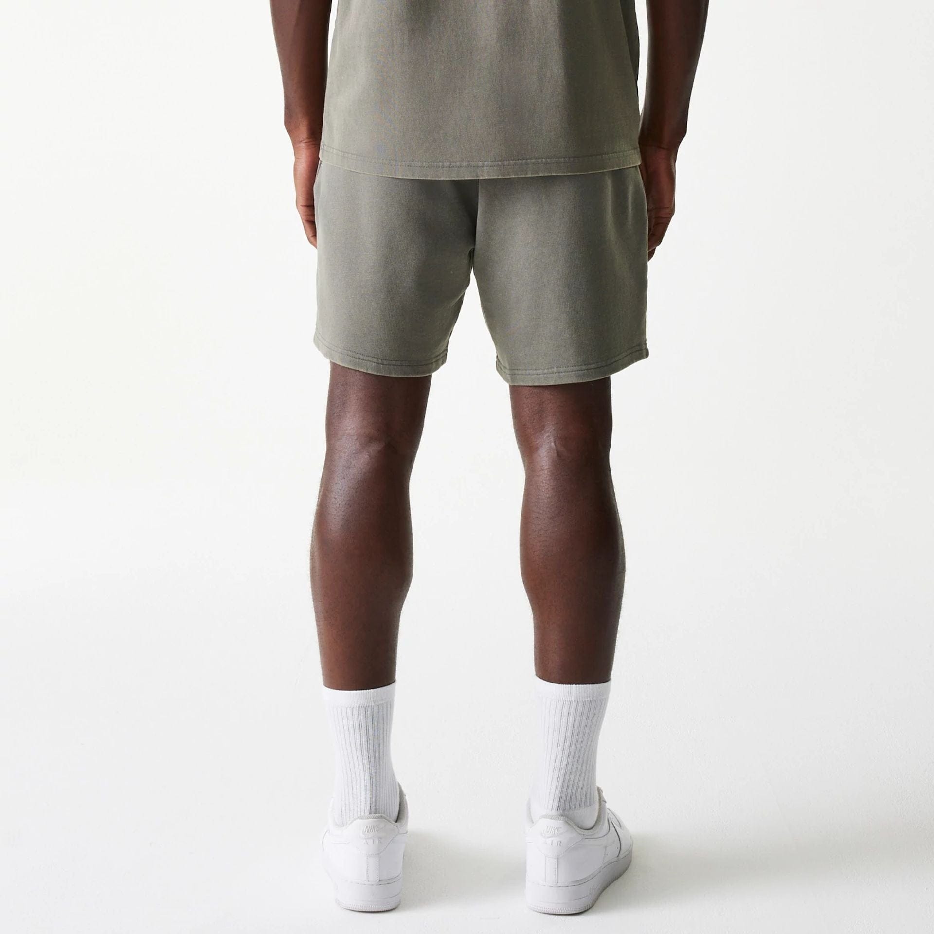 The Male model is wearing LA Lakers NBA Washed Grey Shorts 2