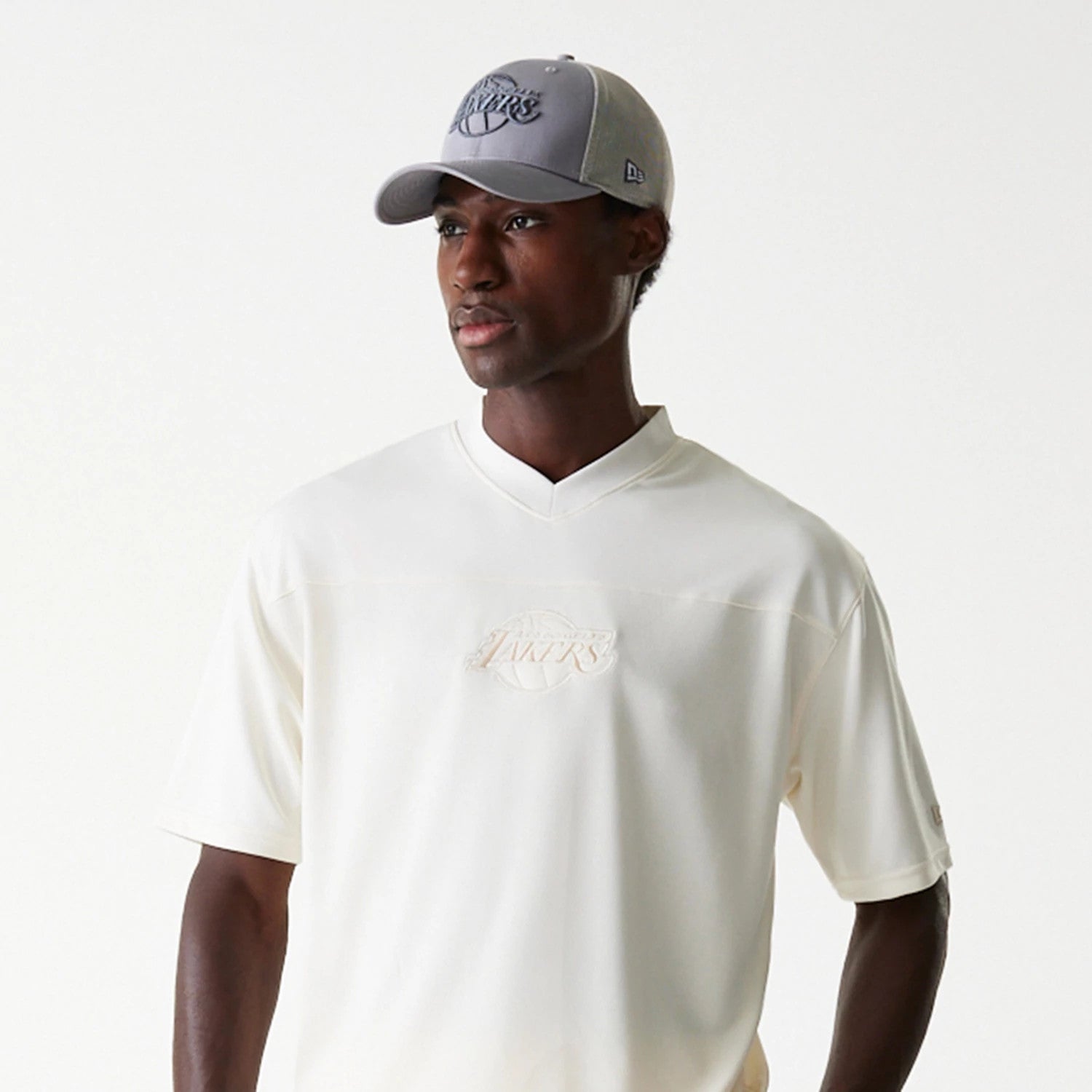 The Male model is wearing LA Lakers NBA Tonal Open White Mesh Jersey 3