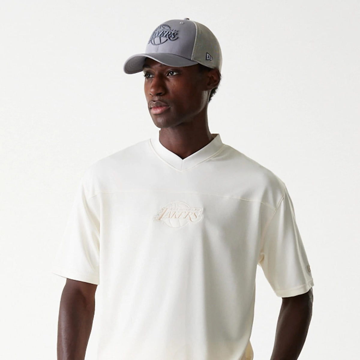 The Male model is wearing LA Lakers NBA Tonal Open White Mesh Jersey 3