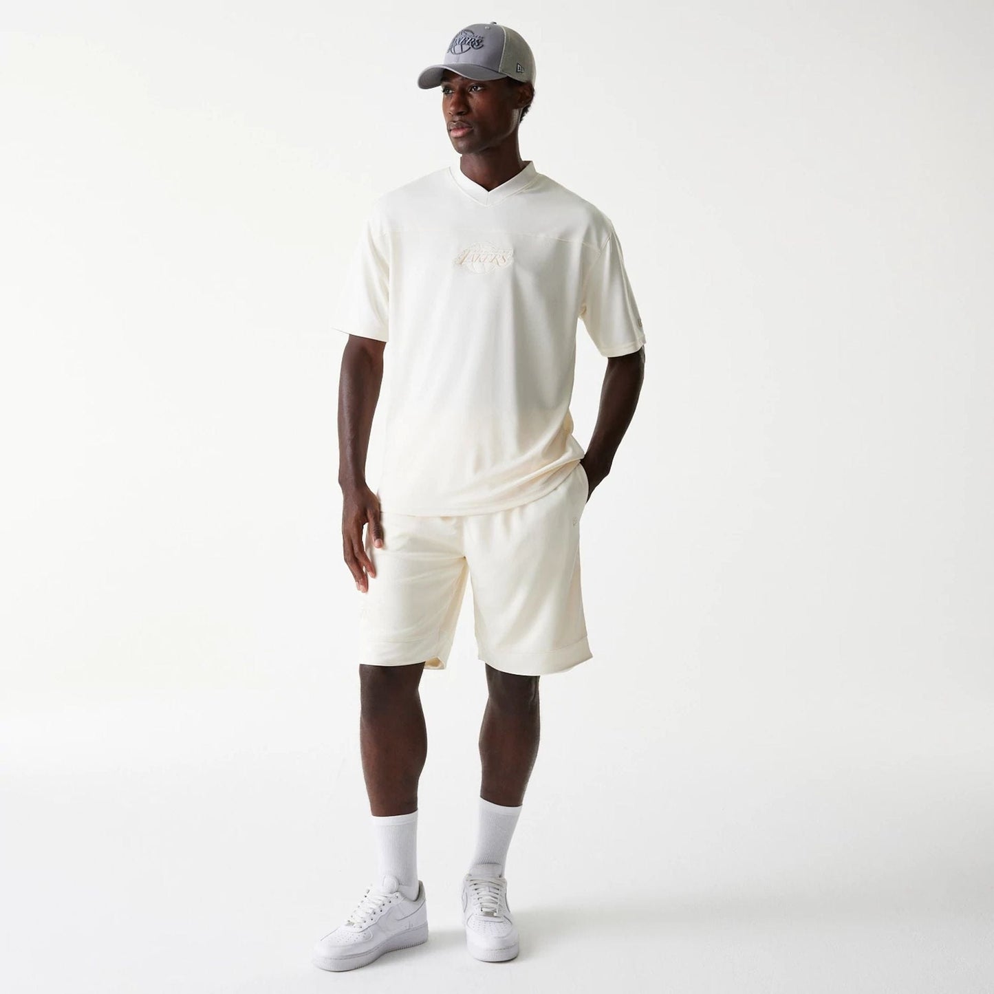 The Male model is wearing LA Lakers NBA Tonal Open White Mesh Jersey 8