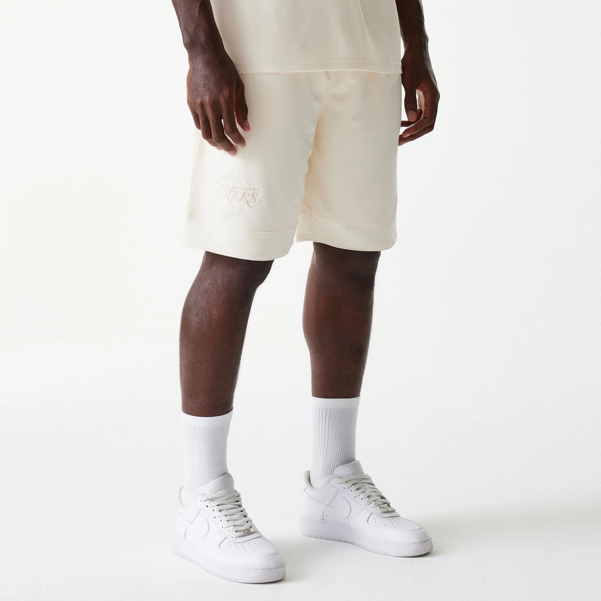 The Male model is wearing LA Lakers NBA Tonal Open White Mesh Shorts 1