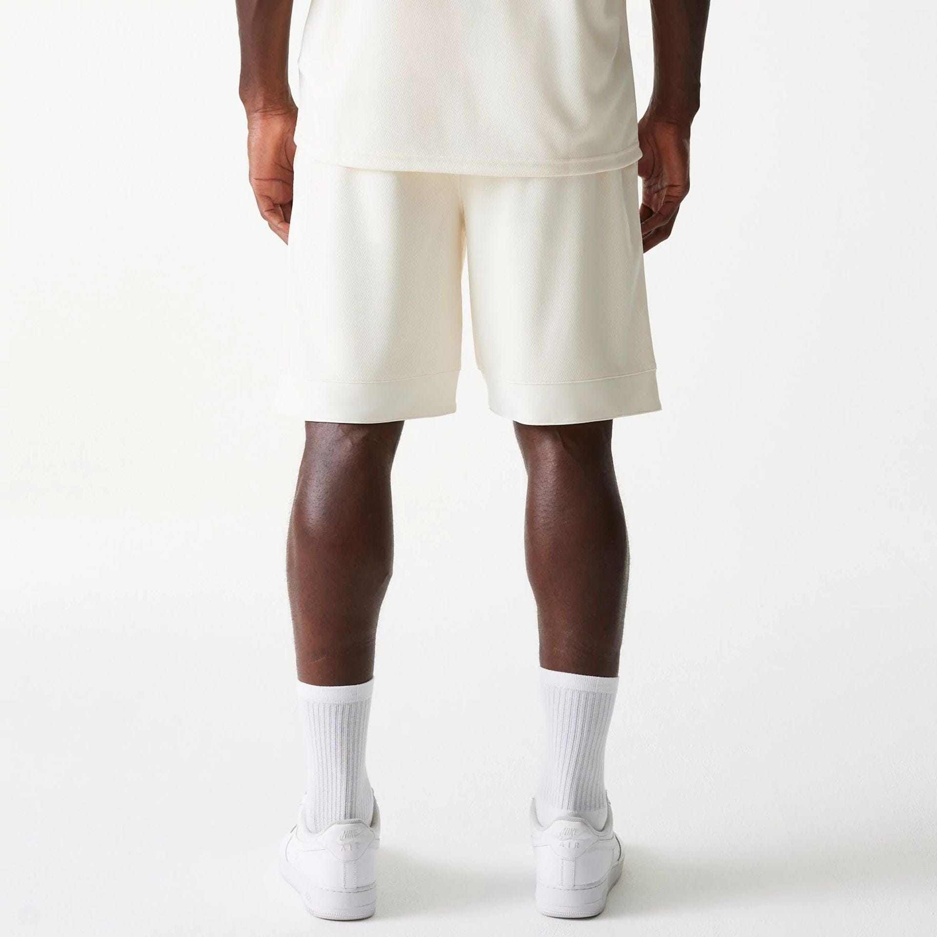 The Male model is wearing LA Lakers NBA Tonal Open White Mesh Shorts 2