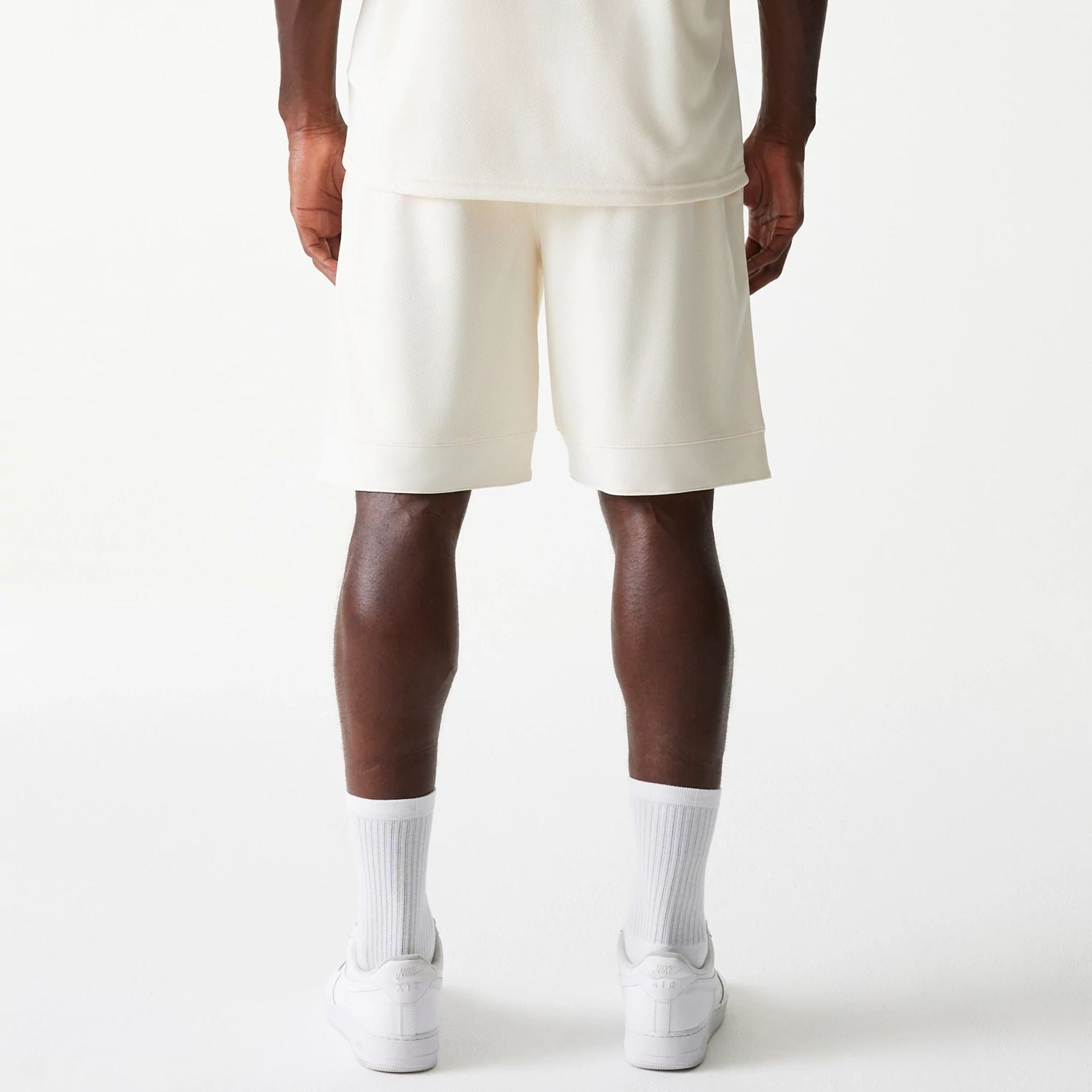 The Male model is wearing LA Lakers NBA Tonal Open White Mesh Shorts 2
