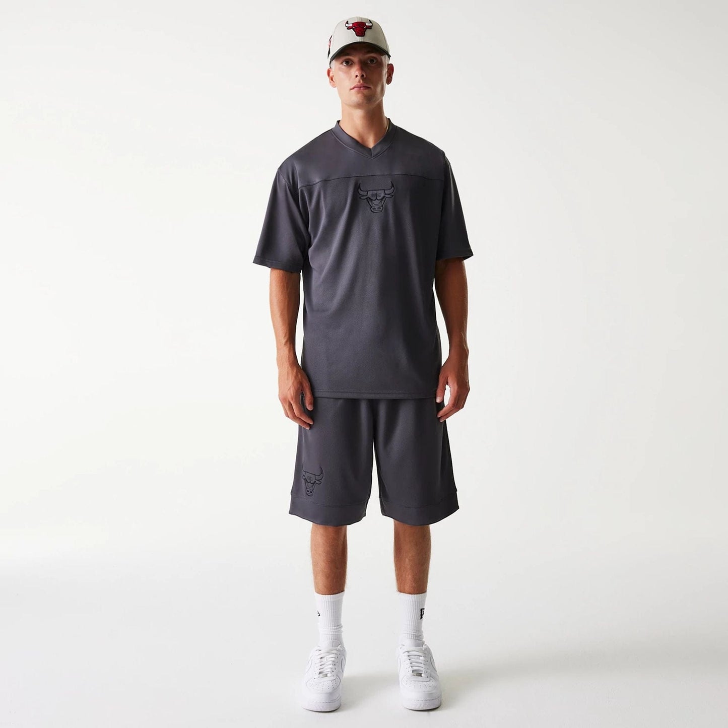 The Male model is wearing Chicago Bulls NBA Tonal Dark Grey Mesh Shorts 8