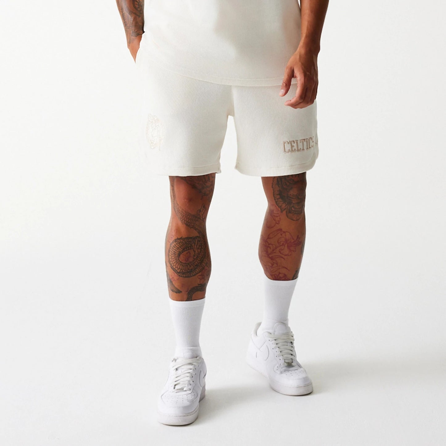 The Male model is wearing Boston Celtics NBA Waffle Open White Shorts 8