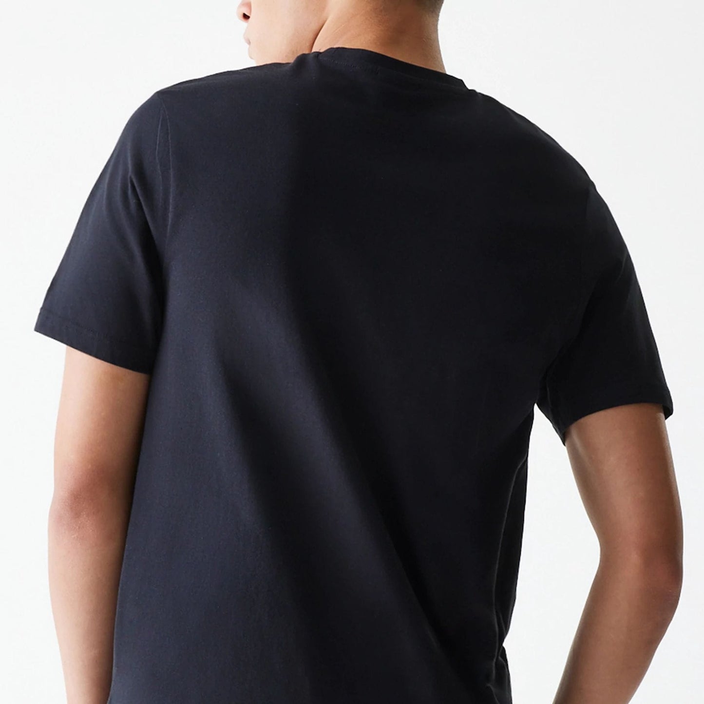 New Era LA Lakers NBA Logo Black T-Shirt, rear view showing the plain black fabric with short sleeves, a seamless neckline, and a smooth back without any visible logos or designs.