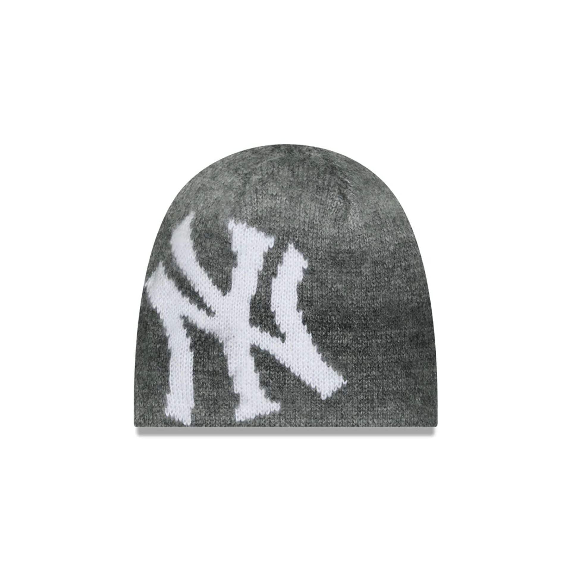 This is a New York Yankees MLB Gradient Grey Skull Knit Beanie Hat 1