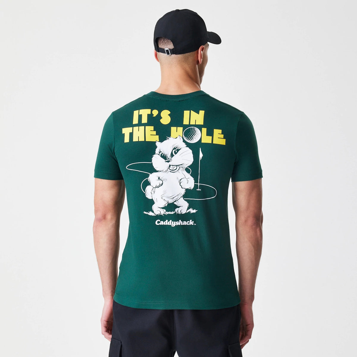 The Male model is wearing Caddyshack It's In The Hole Dark Green T-Shirt 2