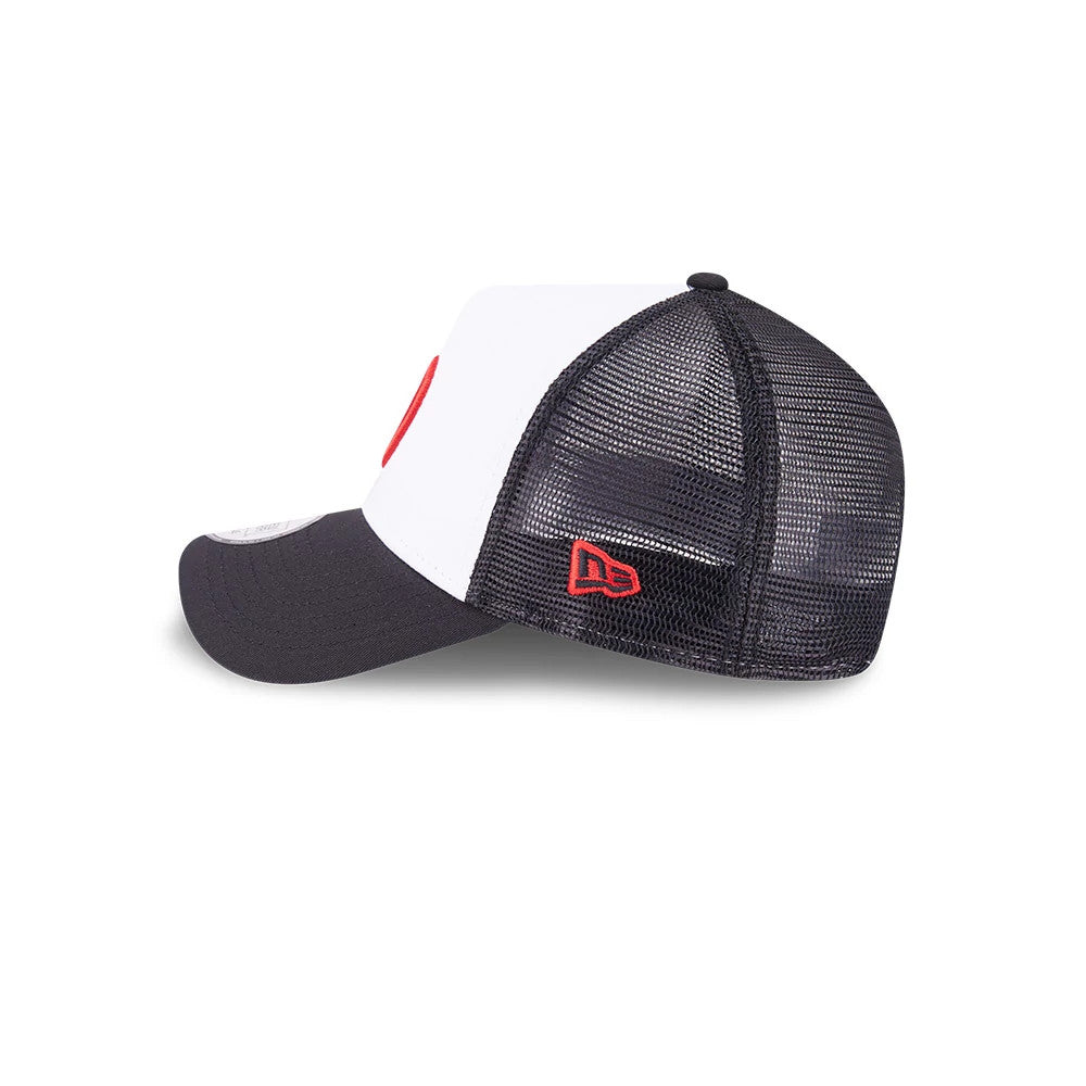 TGR Haas F1 Black New Era 9FORTY E-Frame Trucker Adjustable Cap, side view showing the red embroidered New Era flag logo on the black mesh back panels and the structured front with a curved visor and 9FORTY size sticker.