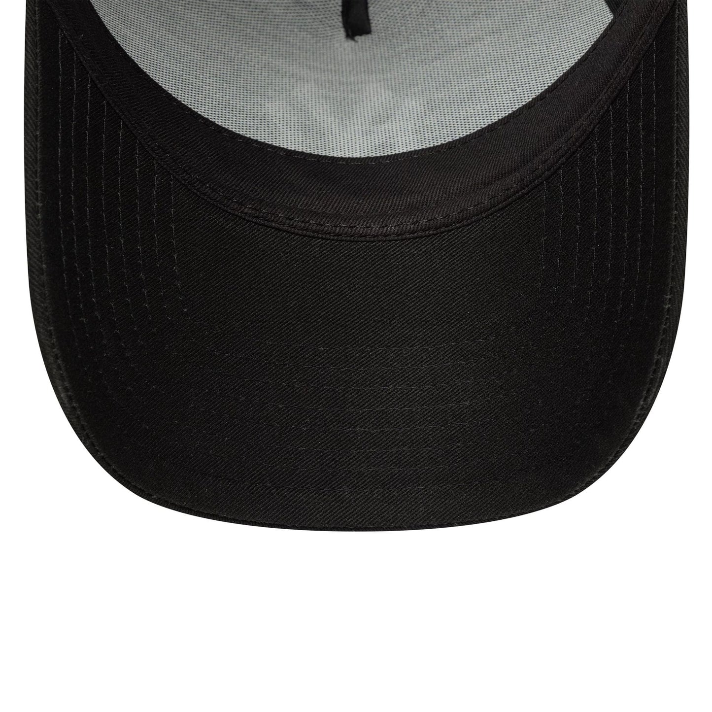New York Yankees MLB League Essential Black New Era 9FORTY E-Frame Adjustable Cap, inside view showing the black undervisor, light grey sweatband, and black taping running across the inner panels.