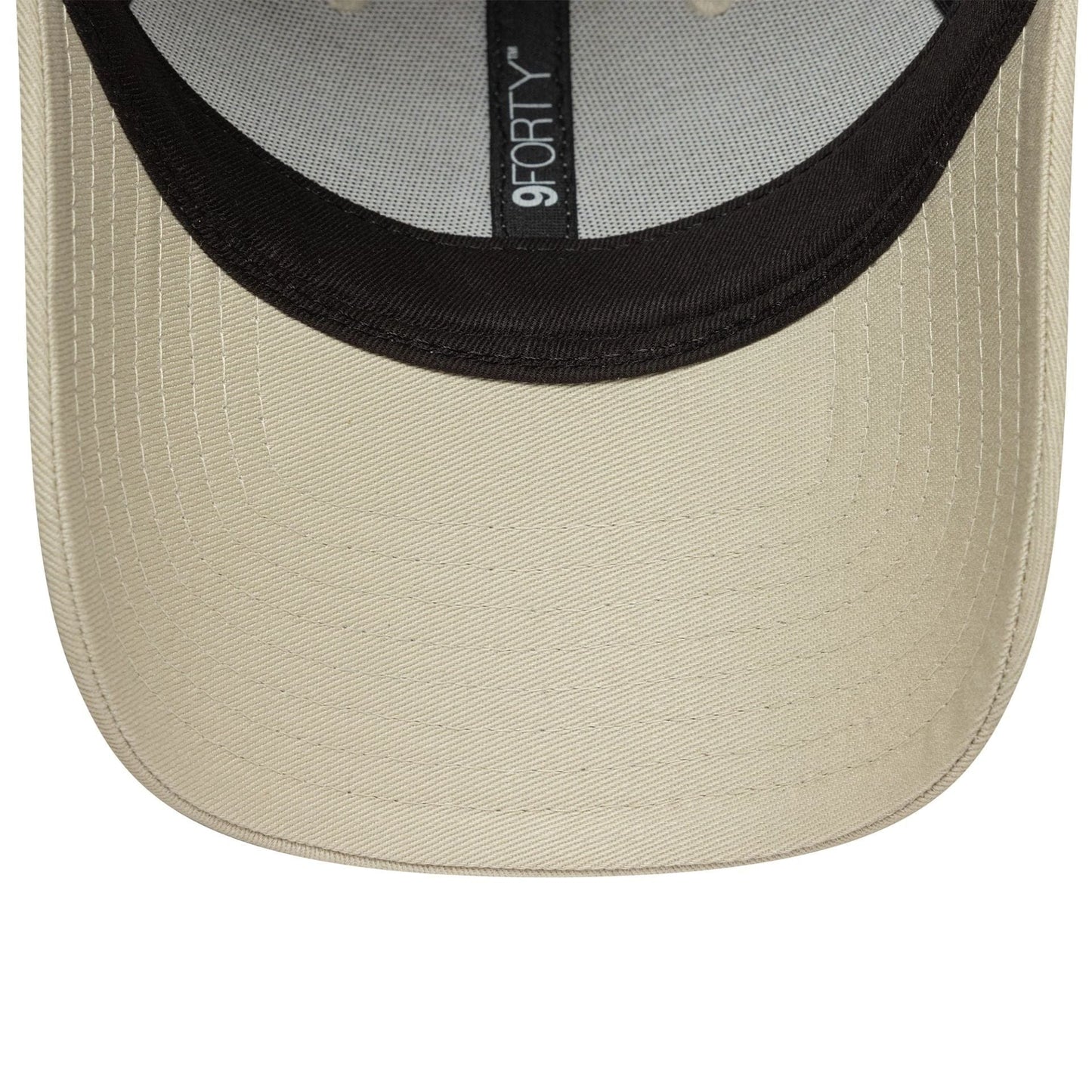 New York Yankees Womens MLB Mini Logo Cream New Era 9FORTY Adjustable Cap, inside view showing a black sweatband with a 9FORTY label, cream undervisor, grey taping, and contrast stitching on the visor.