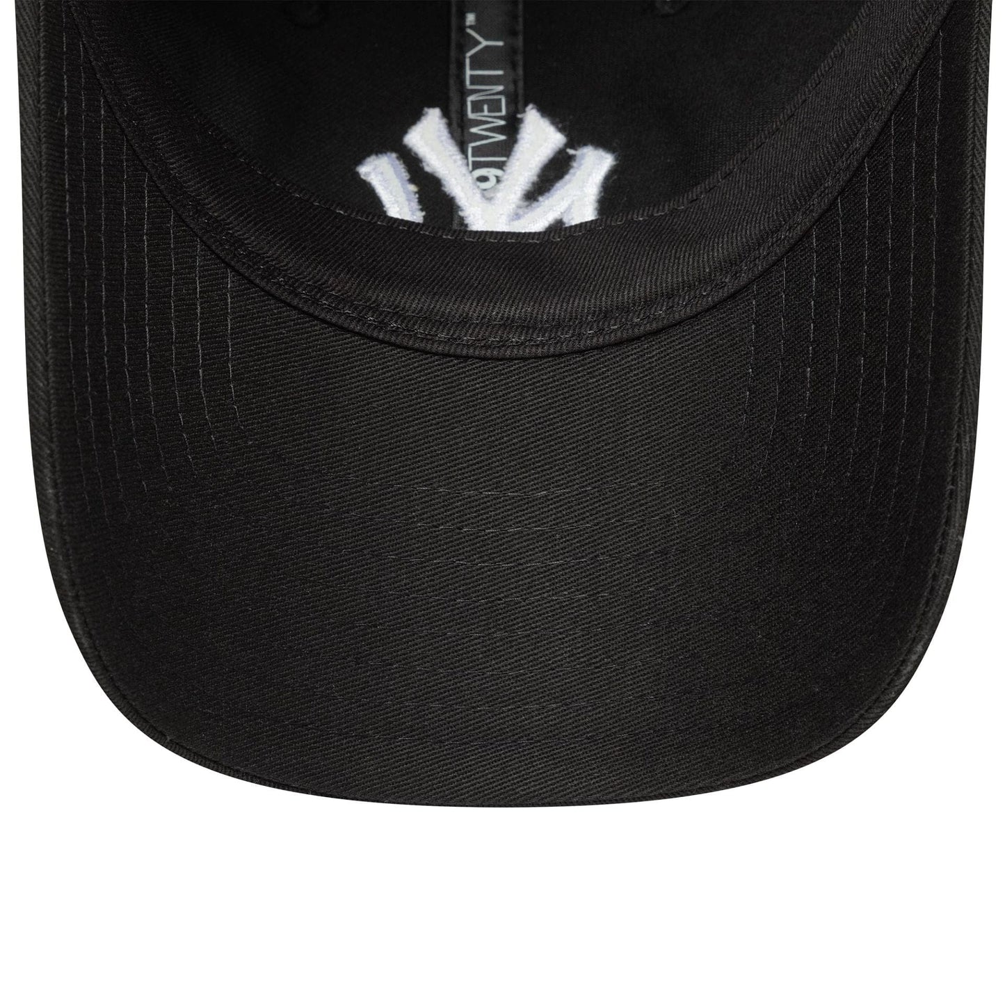 New York Yankees Womens MLB League Essential Black New Era 9TWENTY Adjustable Cap, inside view showing the under visor with white Yankees logo embroidery and a black sweatband, featuring the 9TWENTY label on the inner taping.