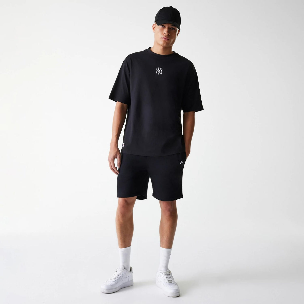 The Male model is wearing New York Yankees MLB League Essential Black Oversized T-Shirt 8