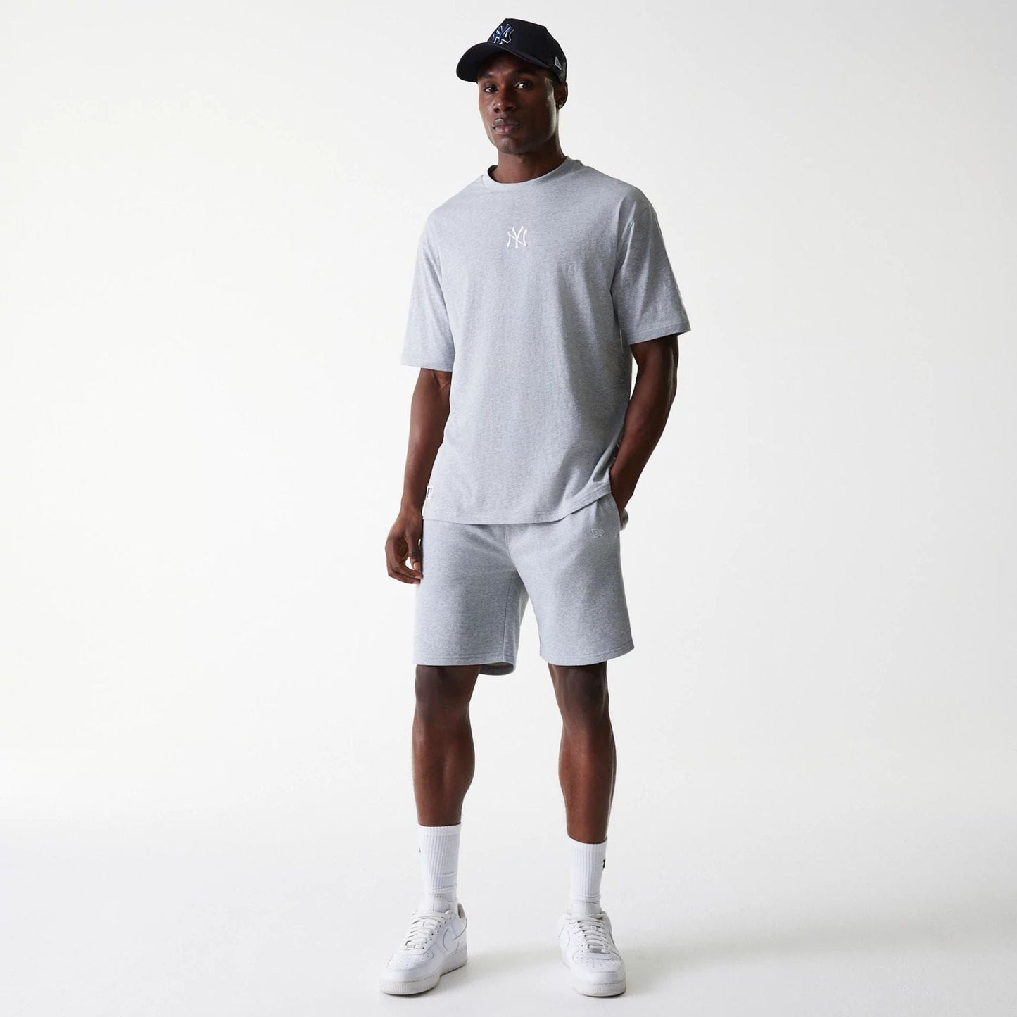 The Male model is wearing New York Yankees MLB League Essential Grey Oversized T-Shirt 8