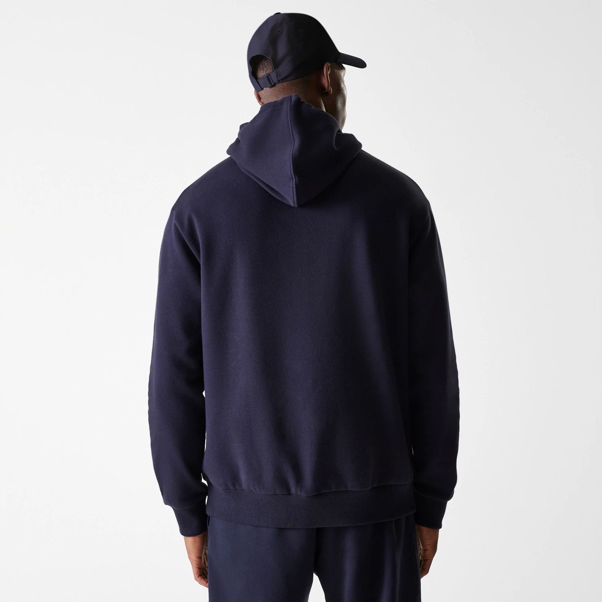 The Male model is wearing New York Yankees MLB League Essential Midi Navy Oversized Pullover Hoodie 2