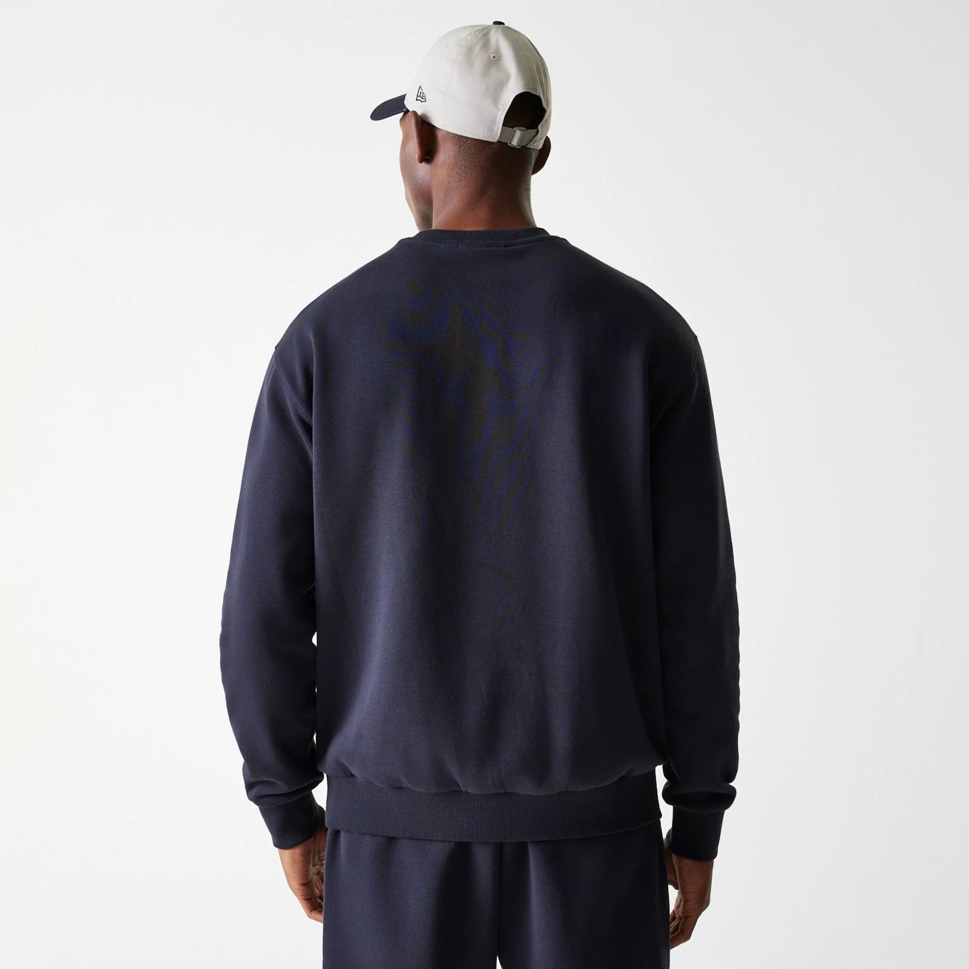The Male model is wearing New York Yankees MLB League Essential Midi Navy Oversized Crew Neck Sweater 2
