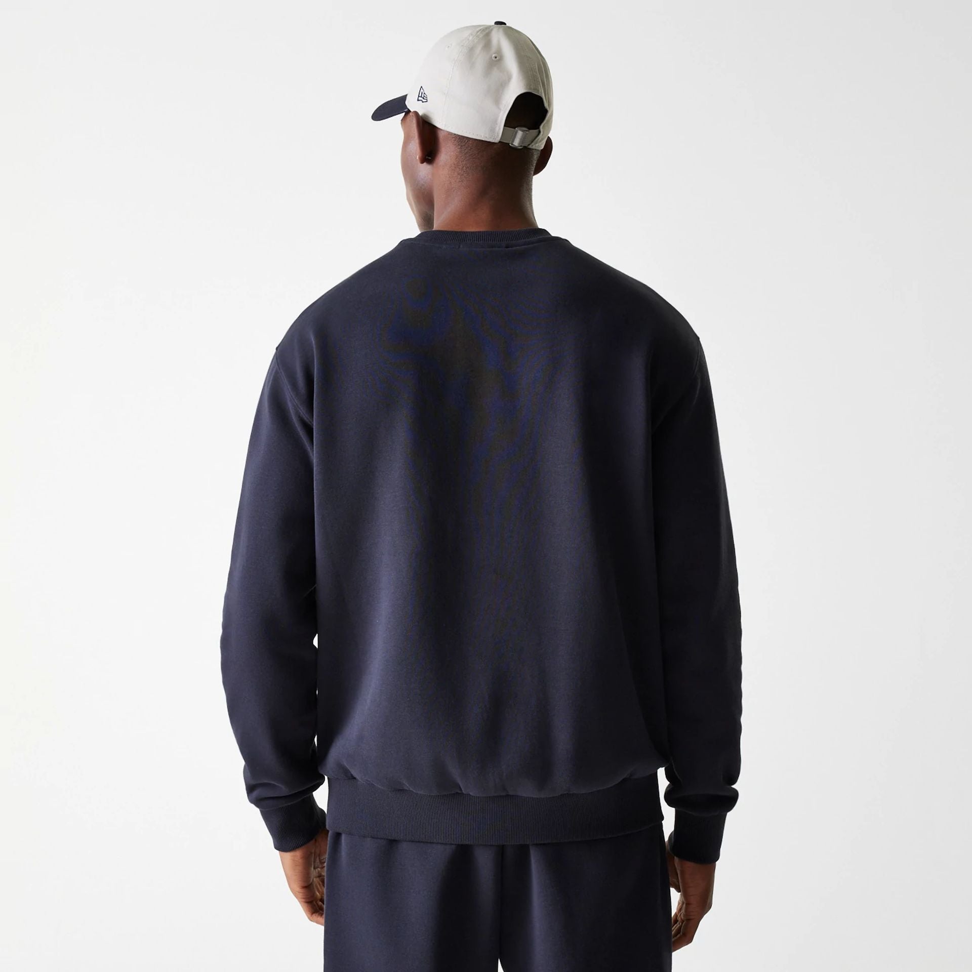 The Male model is wearing New York Yankees MLB League Essential Midi Navy Oversized Crew Neck Sweater 2
