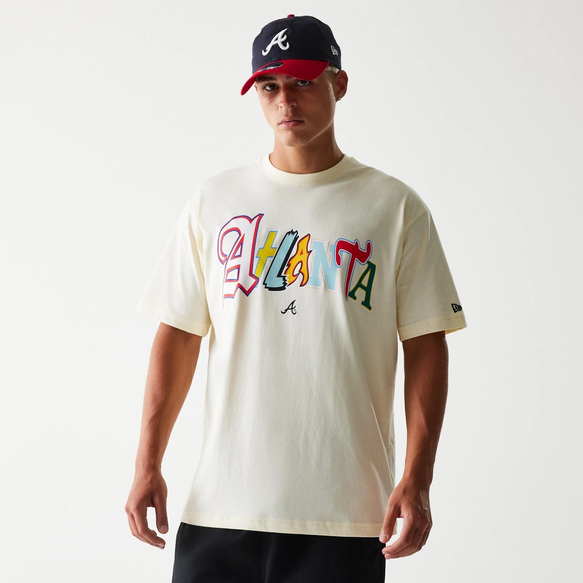 The Male model is wearing Atlanta Braves Life Graphic Cream T-Shirt 1