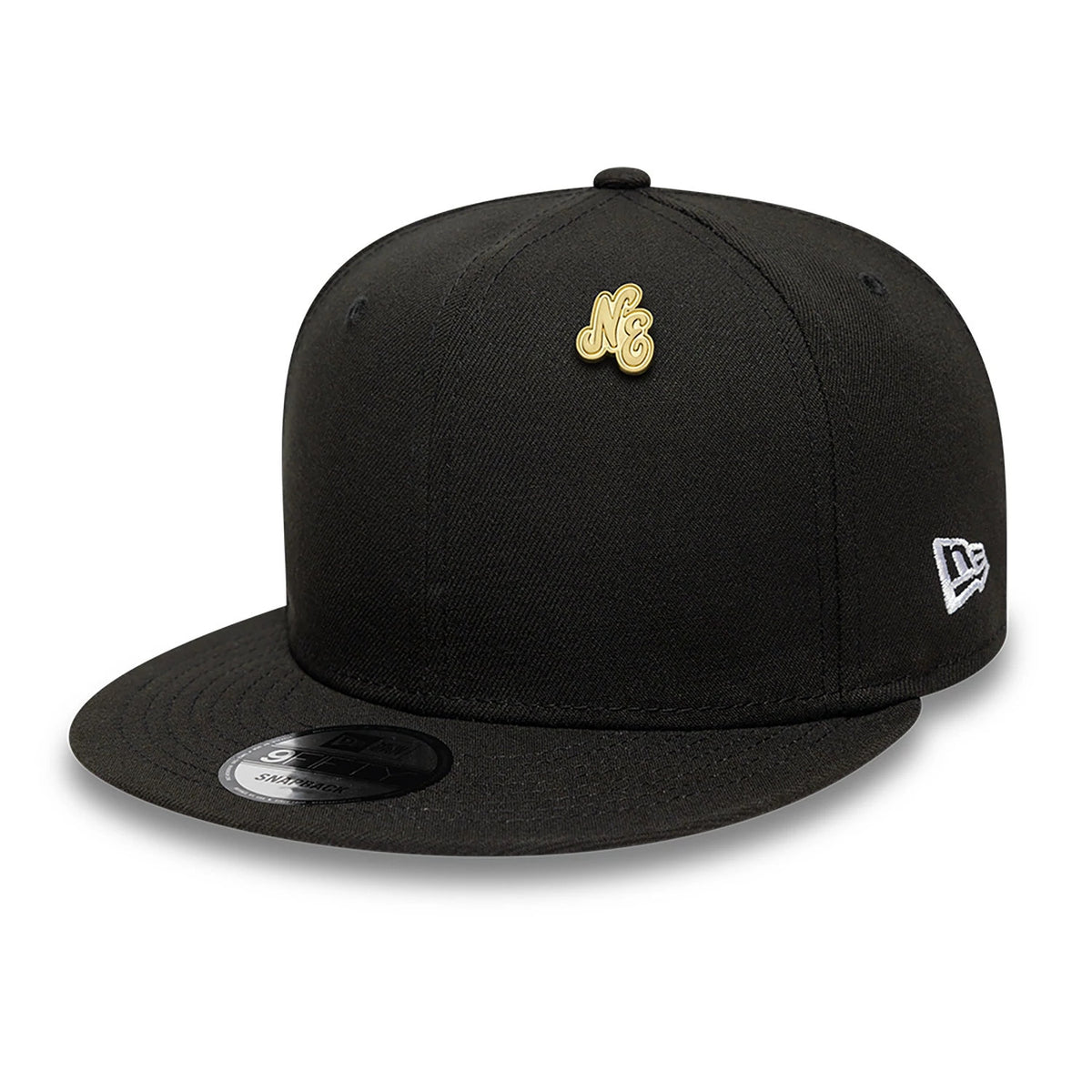 New Era Script Heritage Connect Gold Pin Badge, front view featuring the gold embossed pin badge on the black cap's crown, a raised New Era logo on the side, and eyelets at the top for detail.