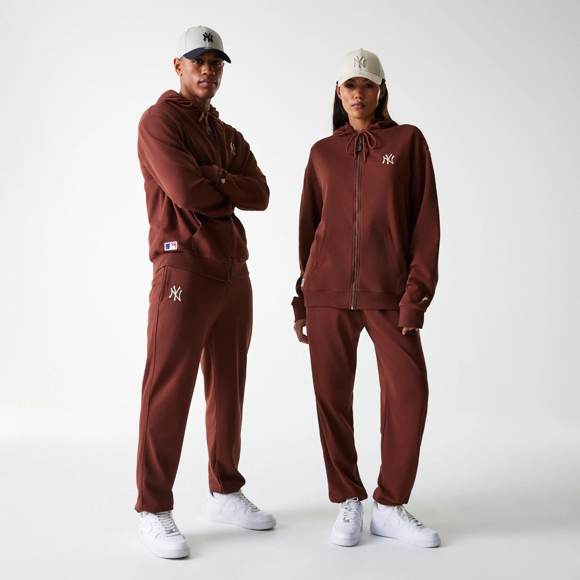 The Male model is wearing New York Yankees MLB Midi League Essential Brown Oversized Full Zip Hoodie 1