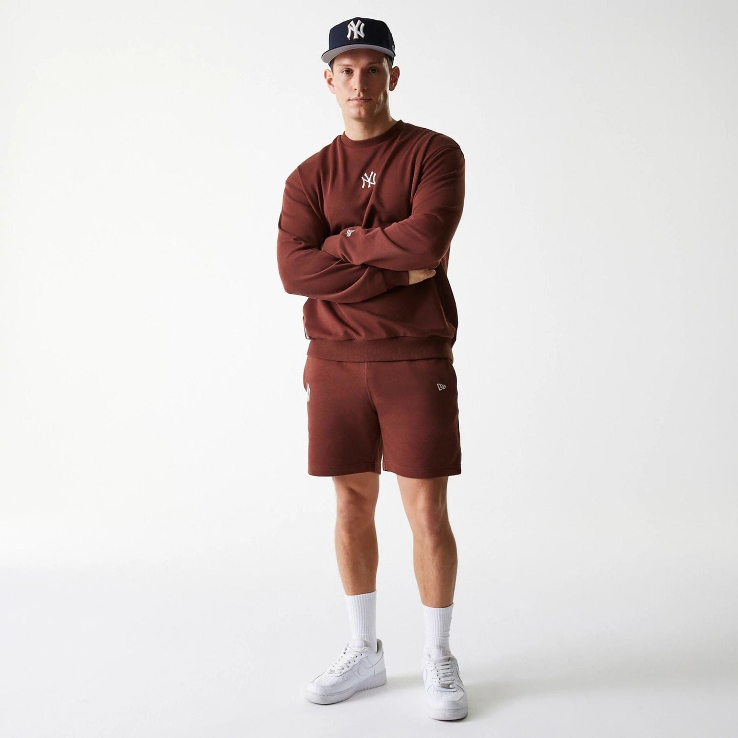 The Male model is wearing New York Yankees MLB Midi League Essential Brown Oversized Crew Neck Sweater 8