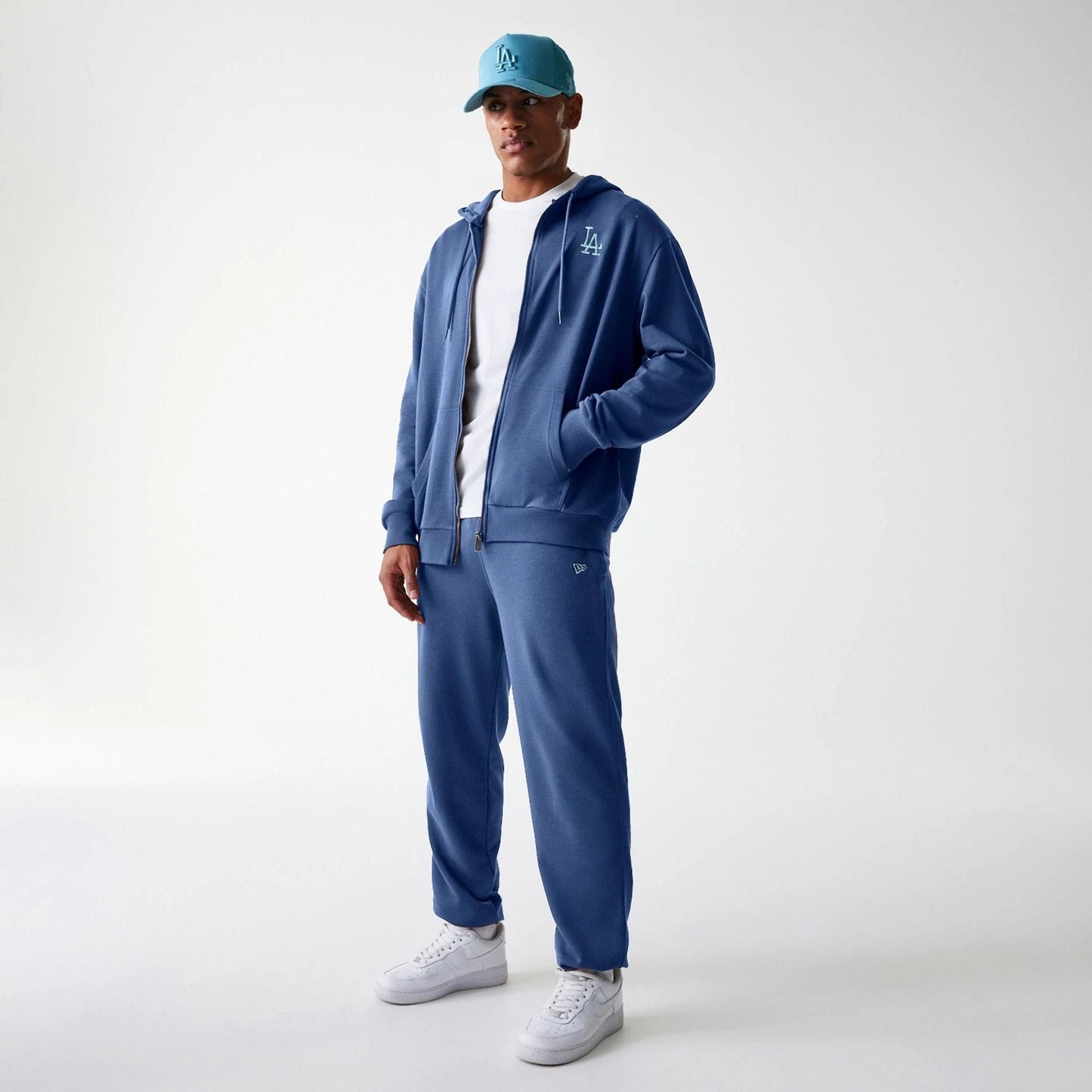 The Male model is wearing LA Dodgers MLB Midi League Essential Blue Joggers 8