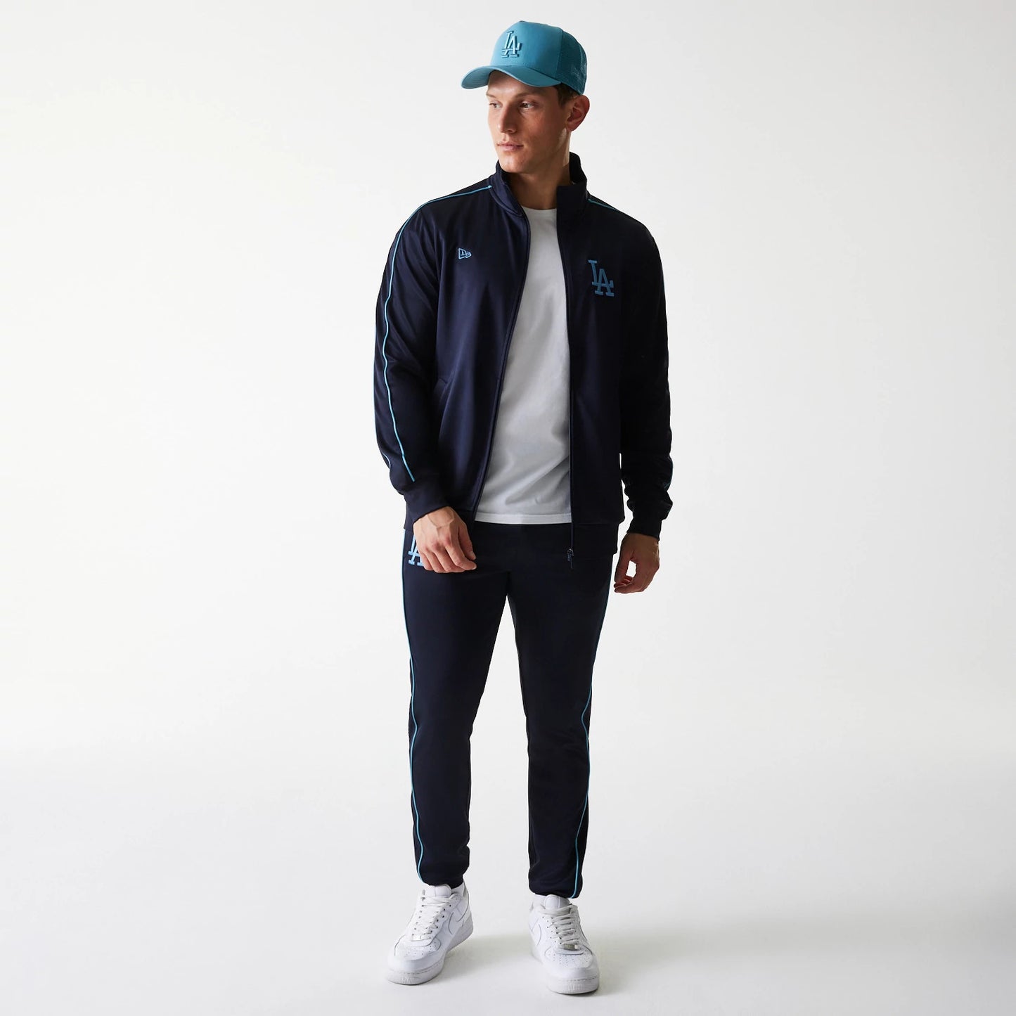 The Male model is wearing LA Dodgers MLB Navy Track Top 8