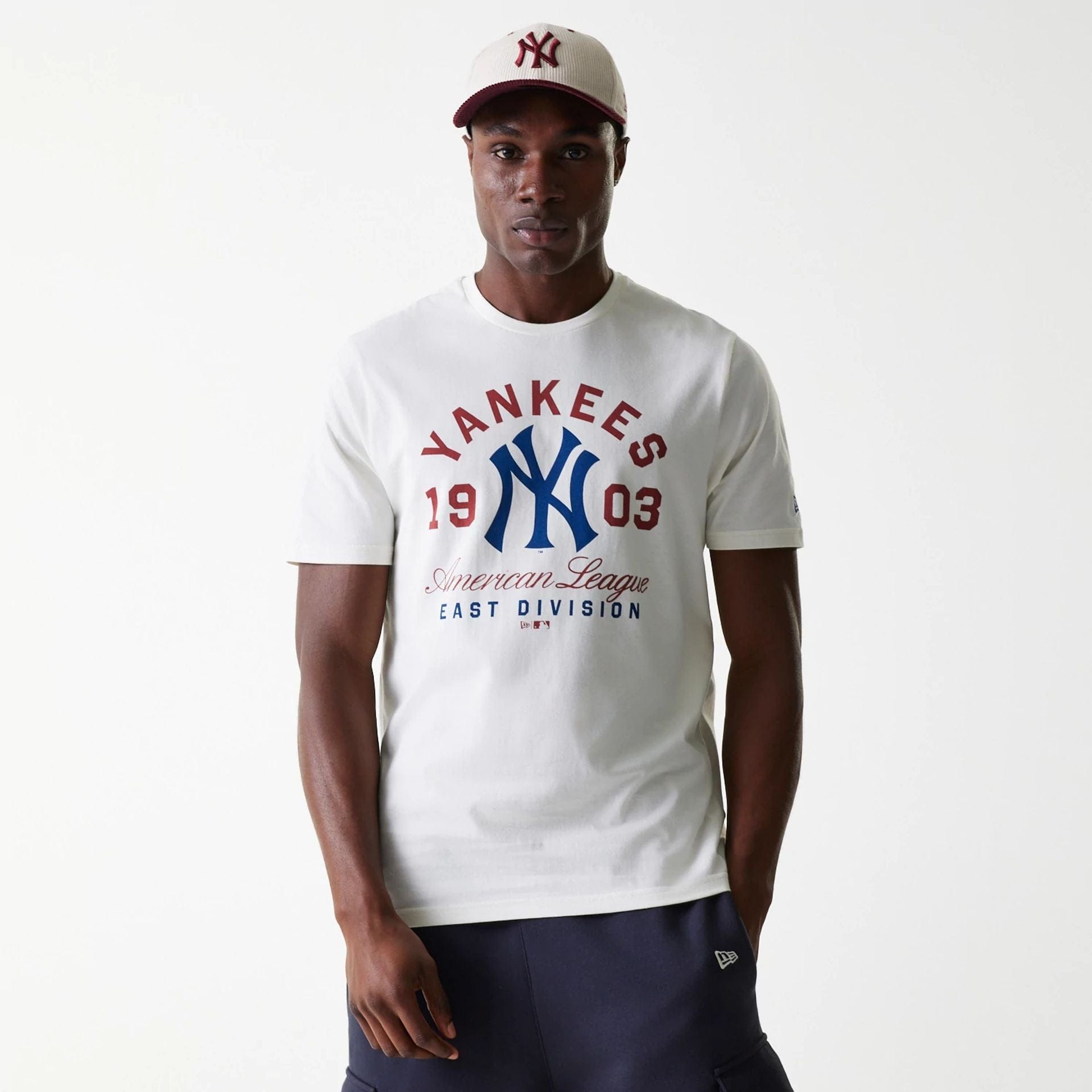 The Male model is wearing New York Yankees MLB Wordmark Open White T-Shirt 1