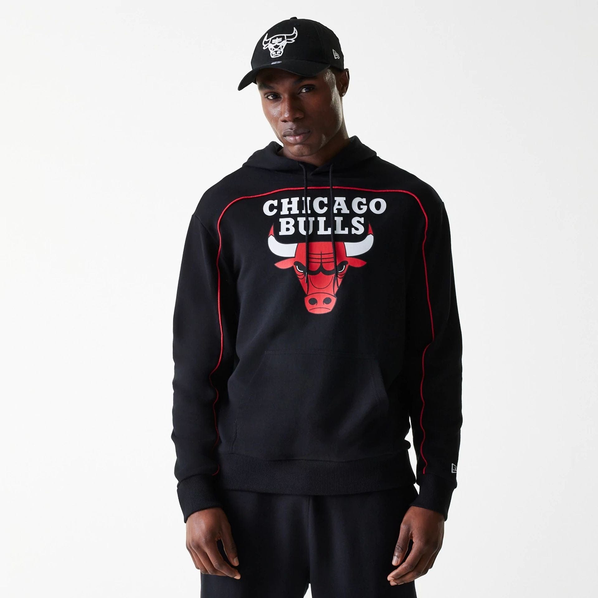 The Male model is wearing Chicago Bulls NBA Piping Black Oversized Pullover Hoodie 1