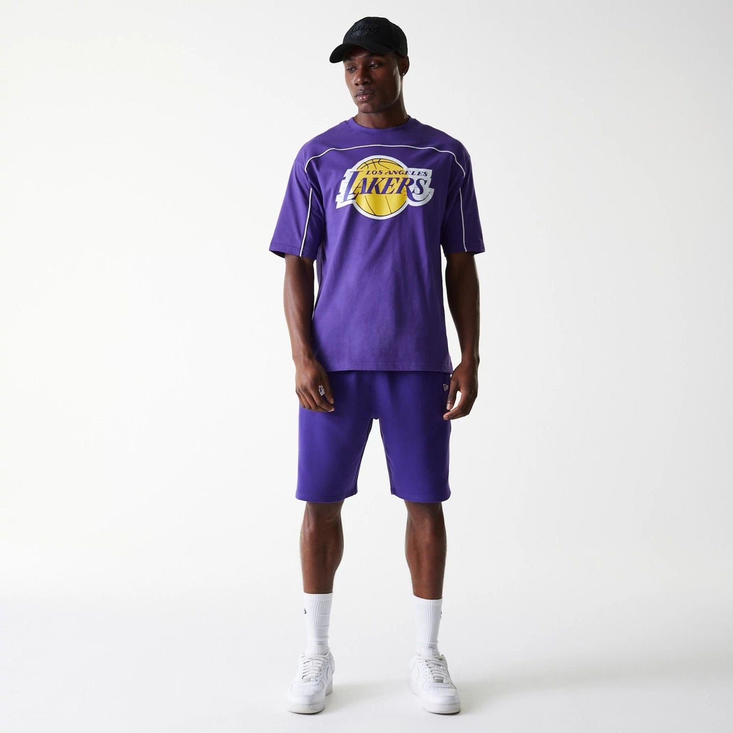The Male model is wearing LA Lakers NBA Piping Purple Oversized T-Shirt 8