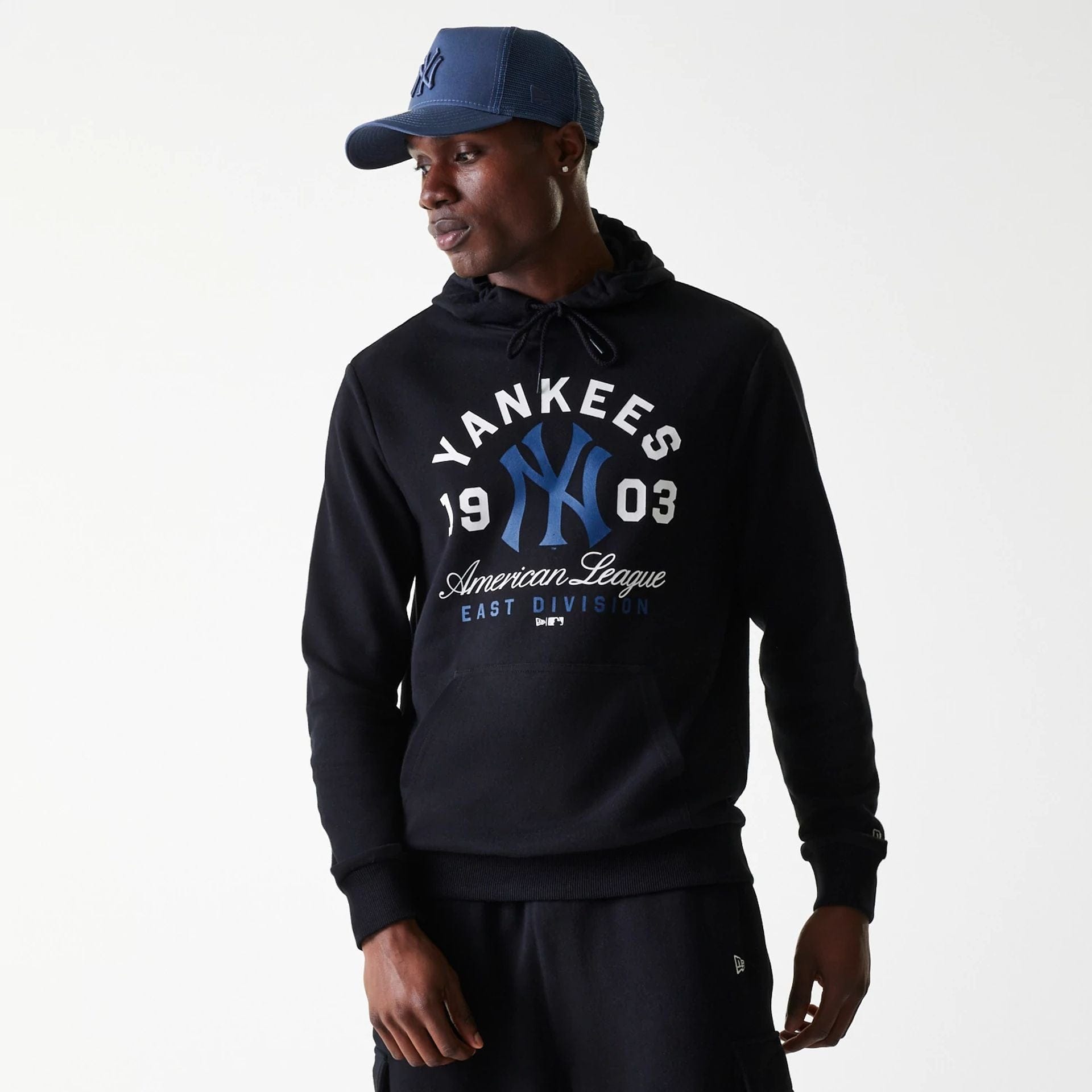 The Male model is wearing New York Yankees MLB Wordmark Black Pullover Hoodie 1