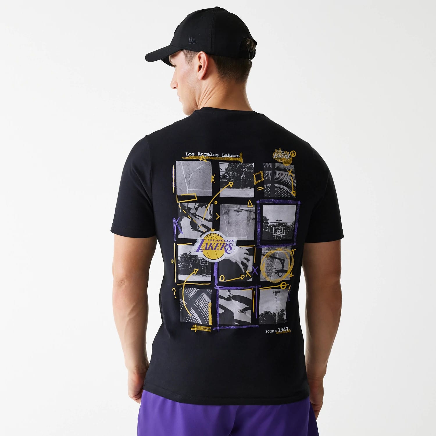 The Male model is wearing LA Lakers NBA Photographic Print Black T-Shirt 2