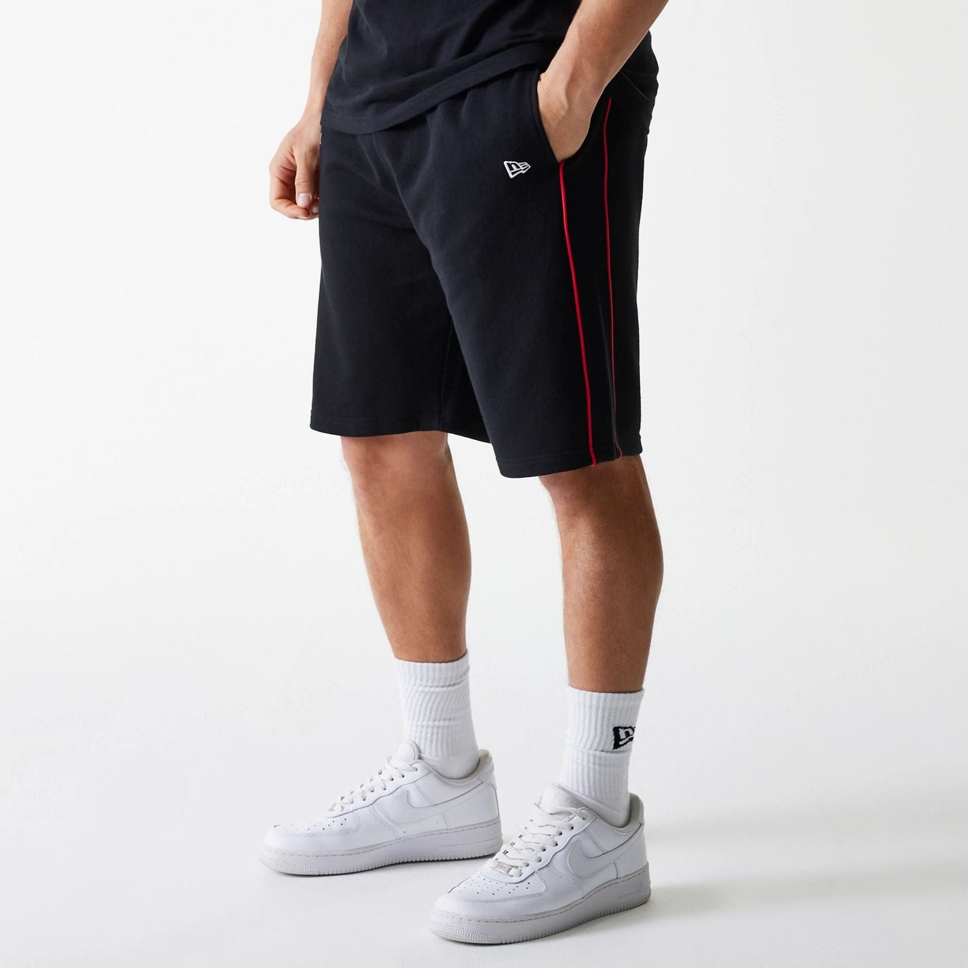 The Male model is wearing Chicago Bulls NBA Piping Black Shorts 1