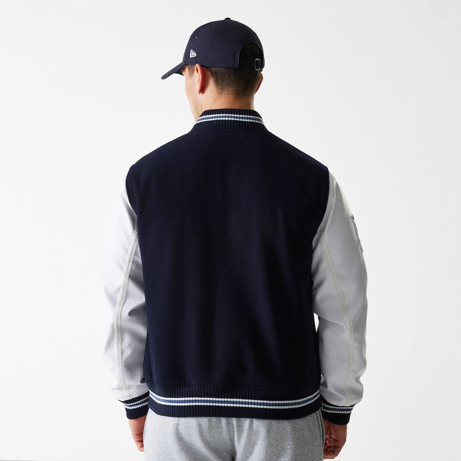 The Male model is wearing LA Dodgers MLB Wordmark Navy Varsity Jacket 2