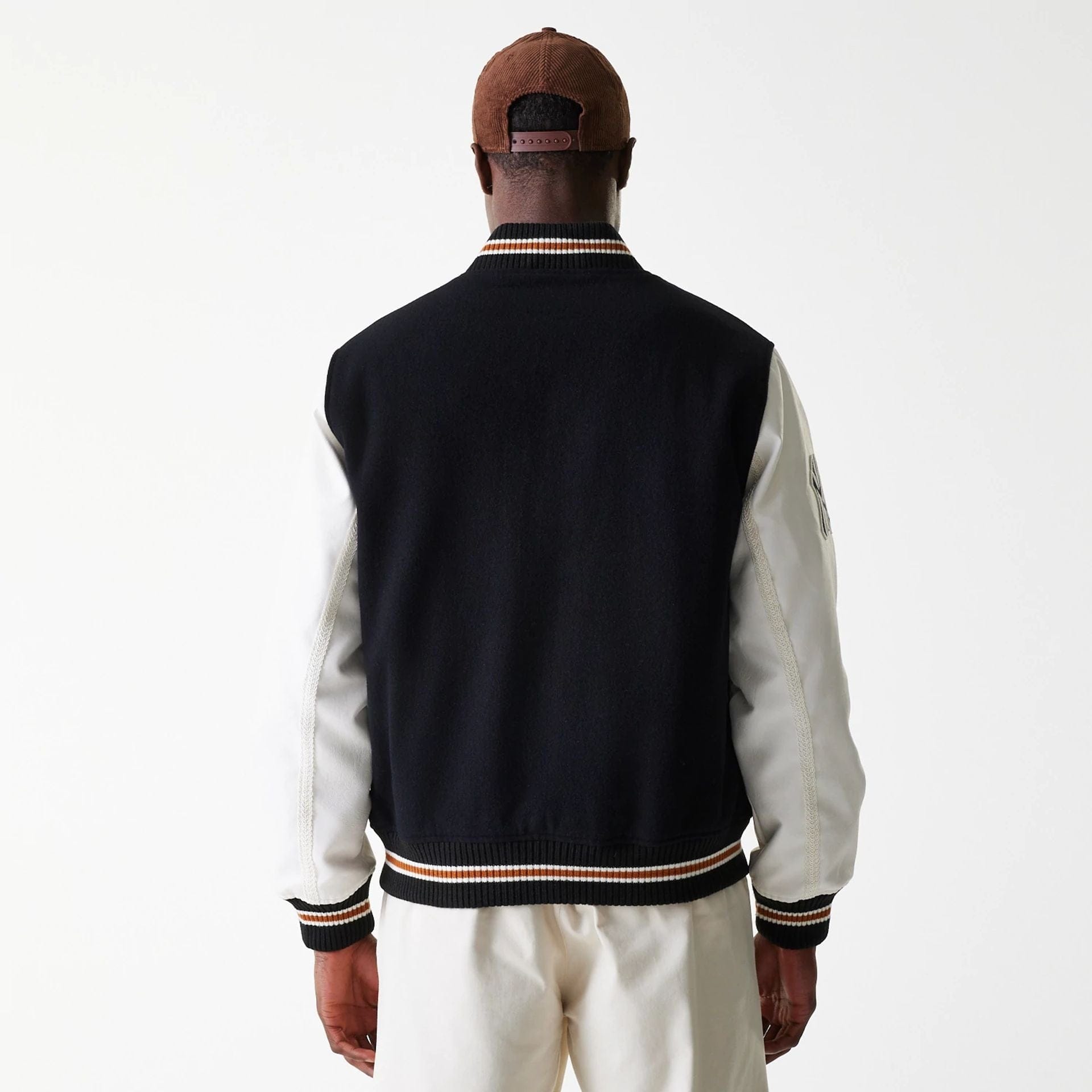 The Male model is wearing New York Yankees MLB Wordmark Black Varsity Jacket 2