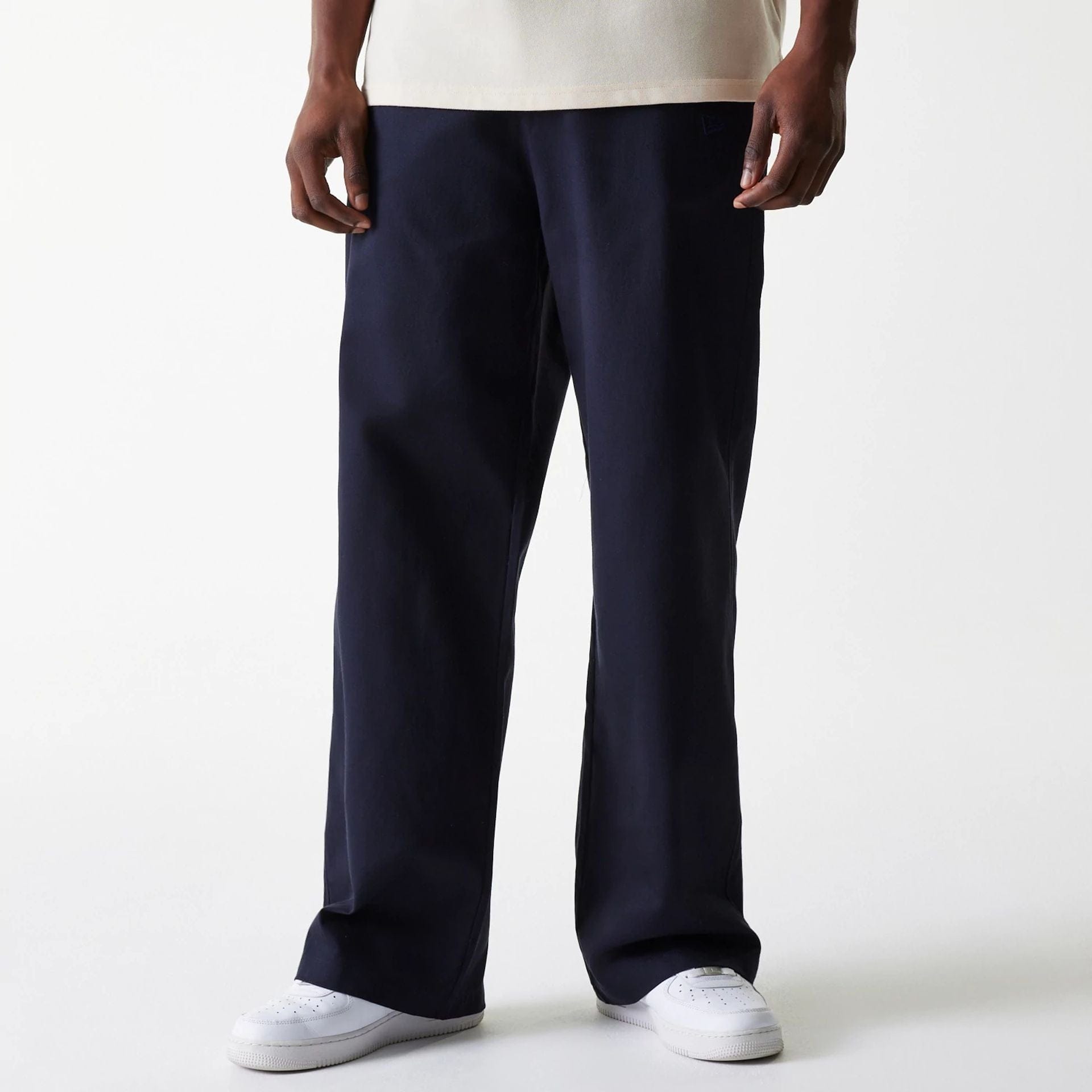The Male model is wearing LA Dodgers MLB Navy Chino Trousers 1