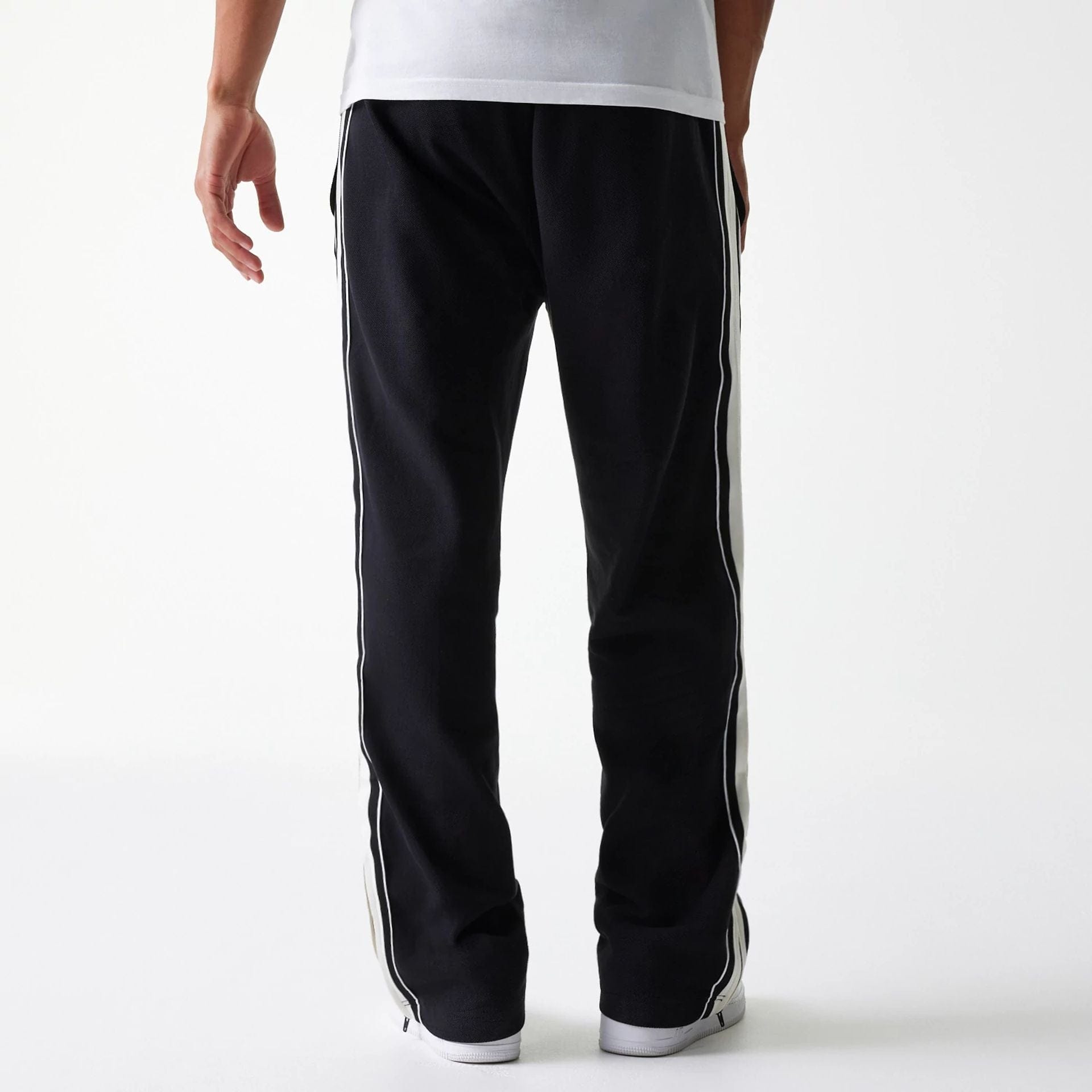 The Male model is wearing Chicago Bulls NBA Outline Black Track Pants 2