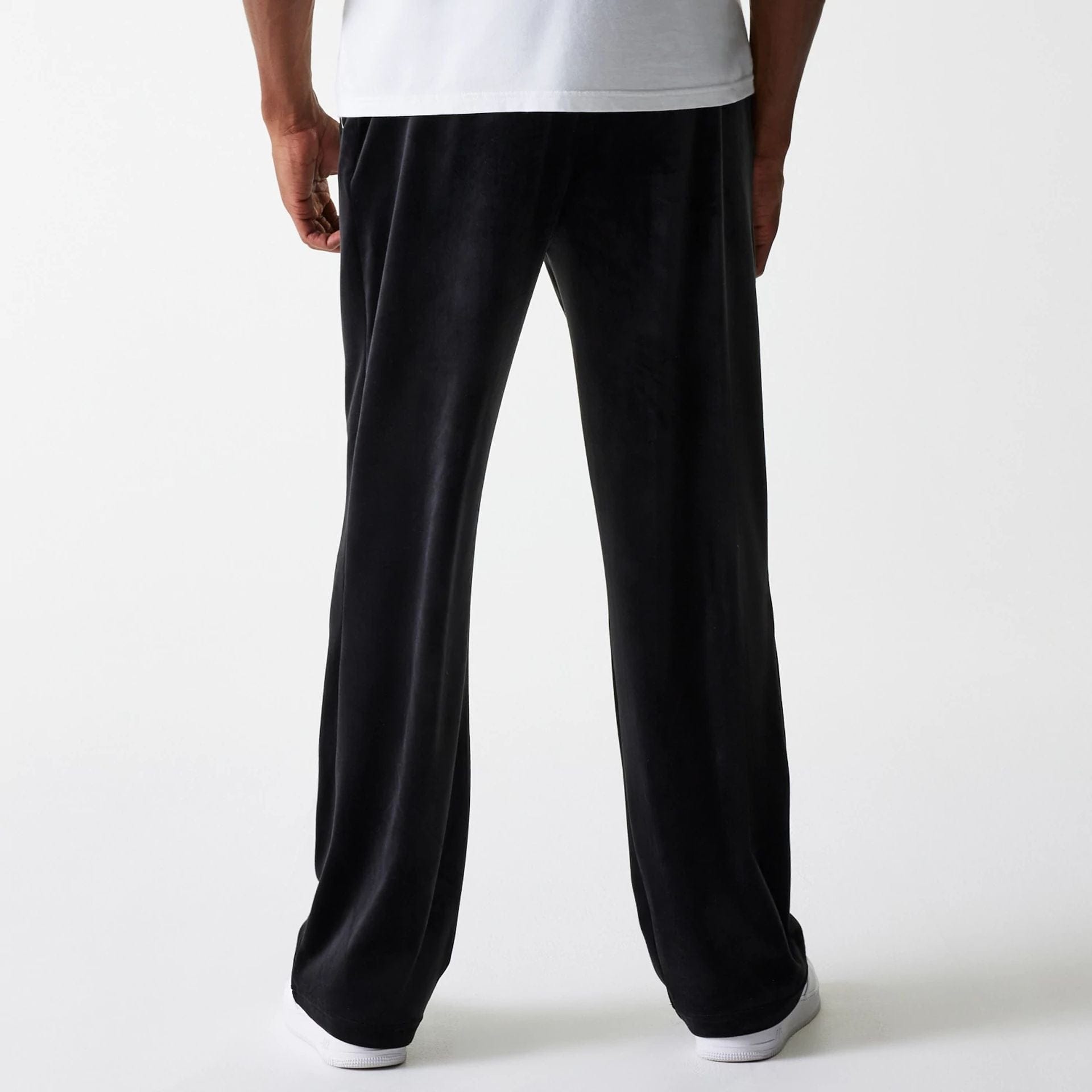 The Male model is wearing New York Yankees MLB Velour Black Track Pants 2