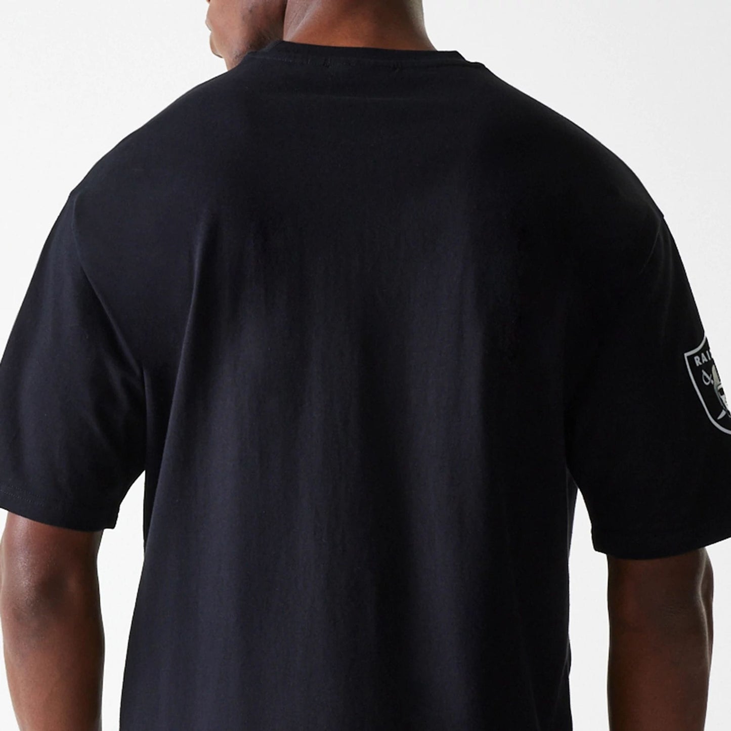 The Male model is wearing Las Vegas Raiders NFL Wordmark Black Oversized T-Shirt 7