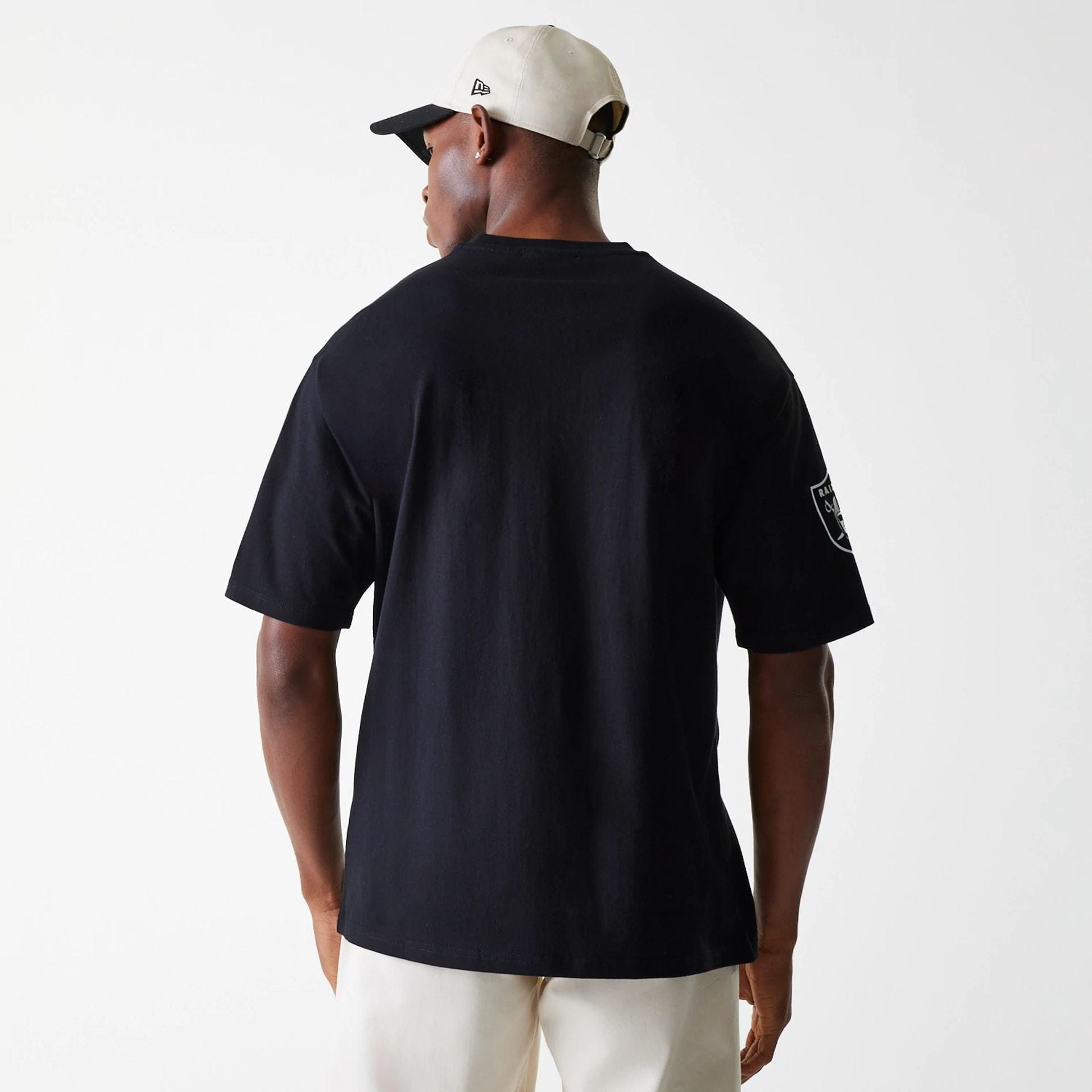 The Male model is wearing Las Vegas Raiders NFL Wordmark Black Oversized T-Shirt 2
